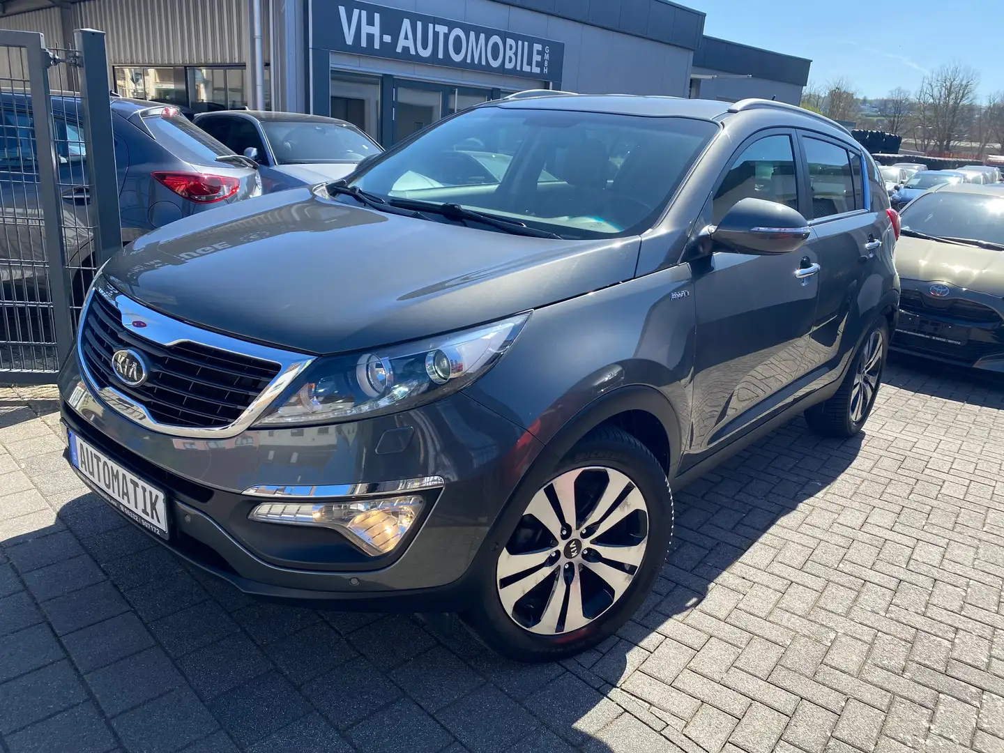 Kia Sportage 4WD Automatik*AHK*ALLWETTER*LEDER*NAVI*Winterpaket Зелений - 1