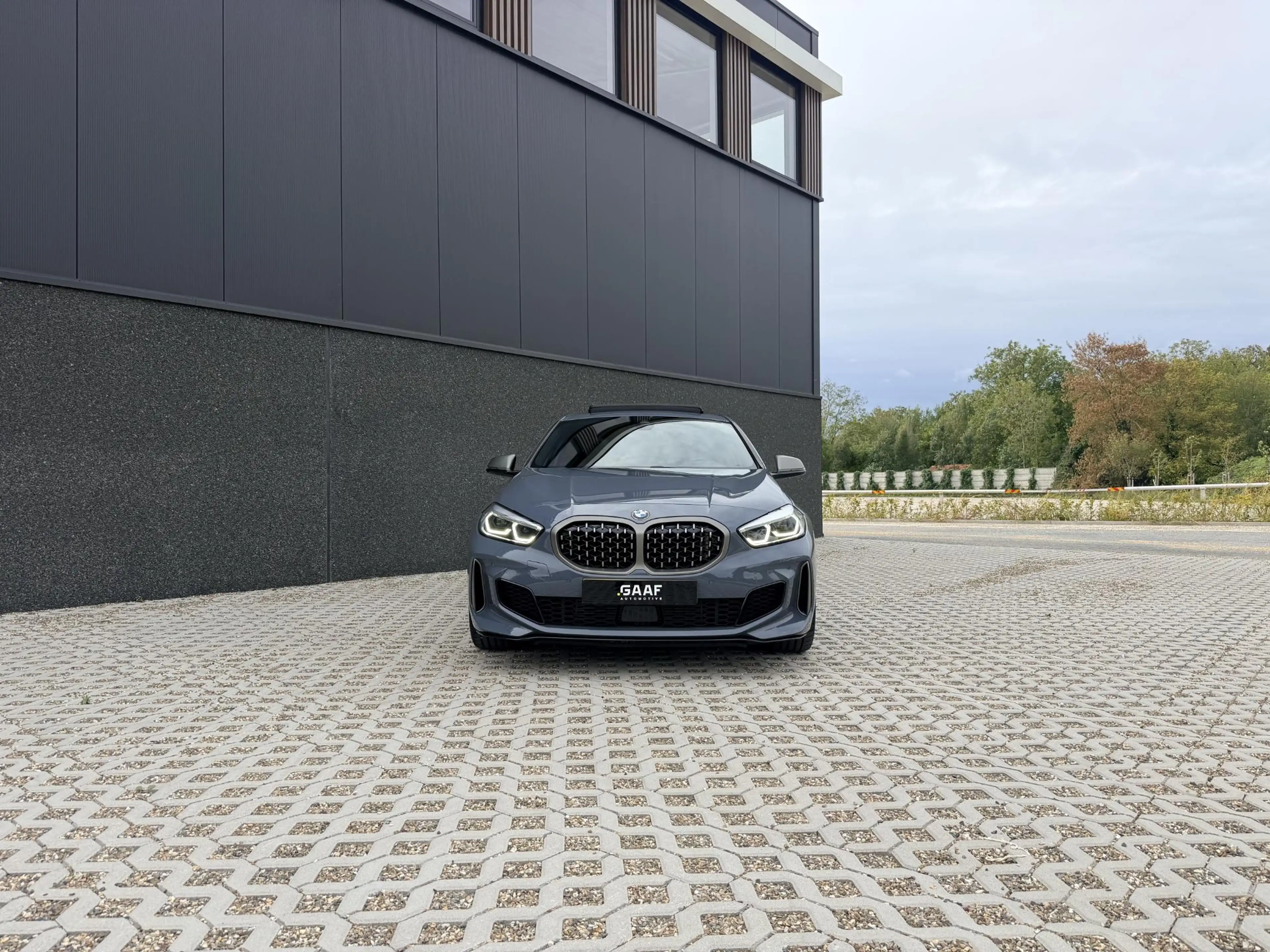 BMW 135 1-serie M135i xDrive High Executive — photo 12