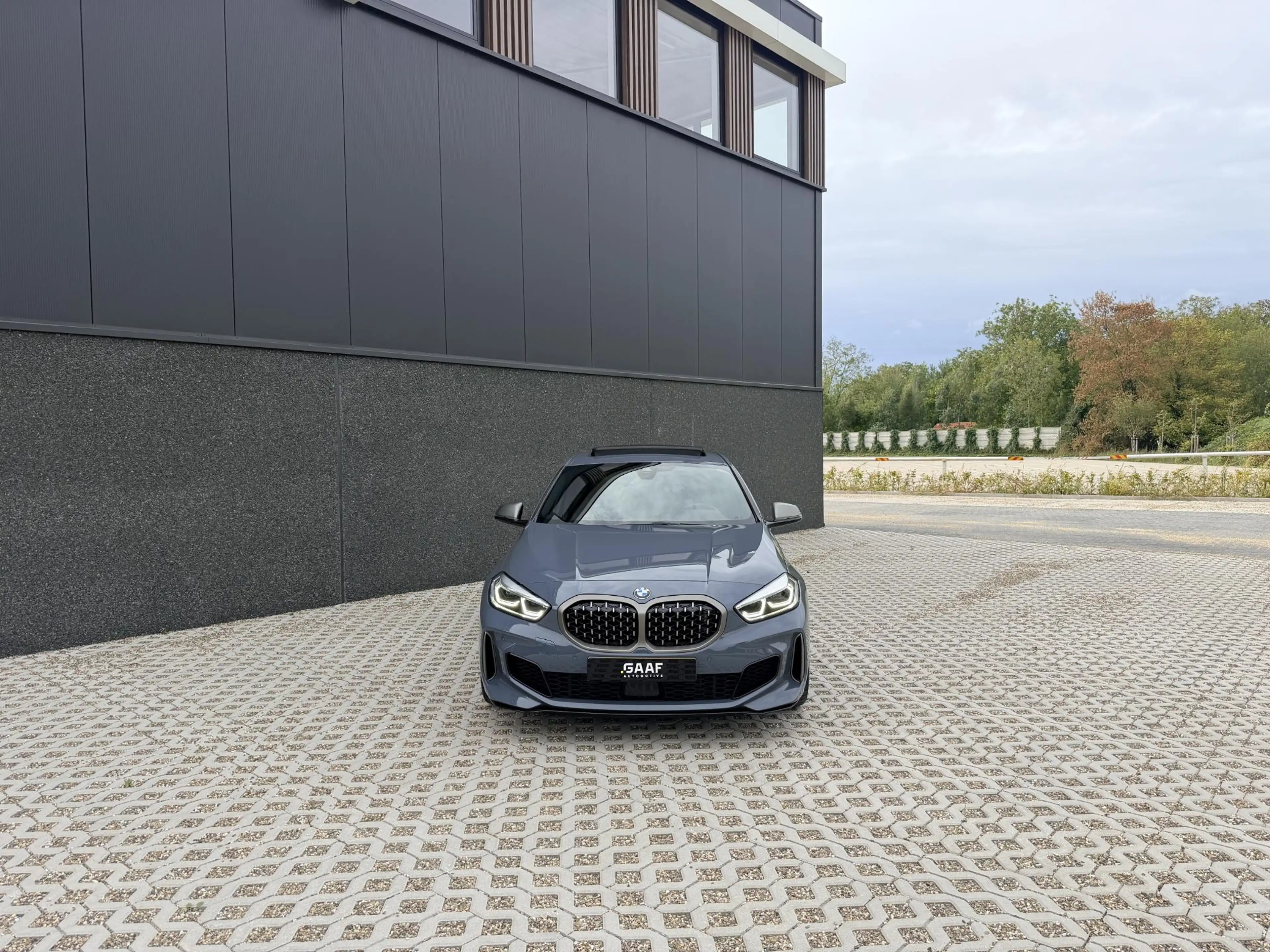 BMW 135 1-serie M135i xDrive High Executive — photo 13