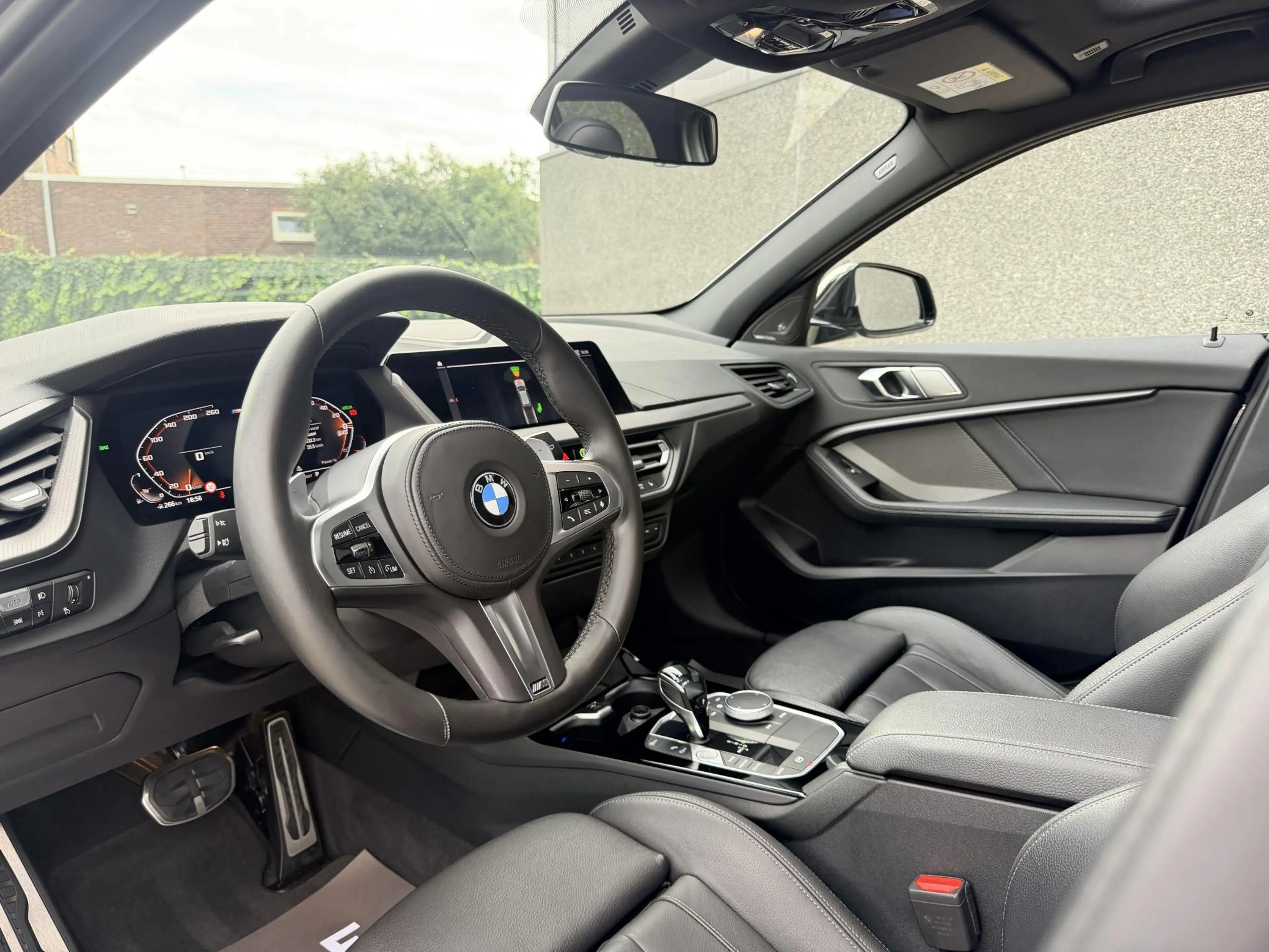BMW 135 1-serie M135i xDrive High Executive — photo 2