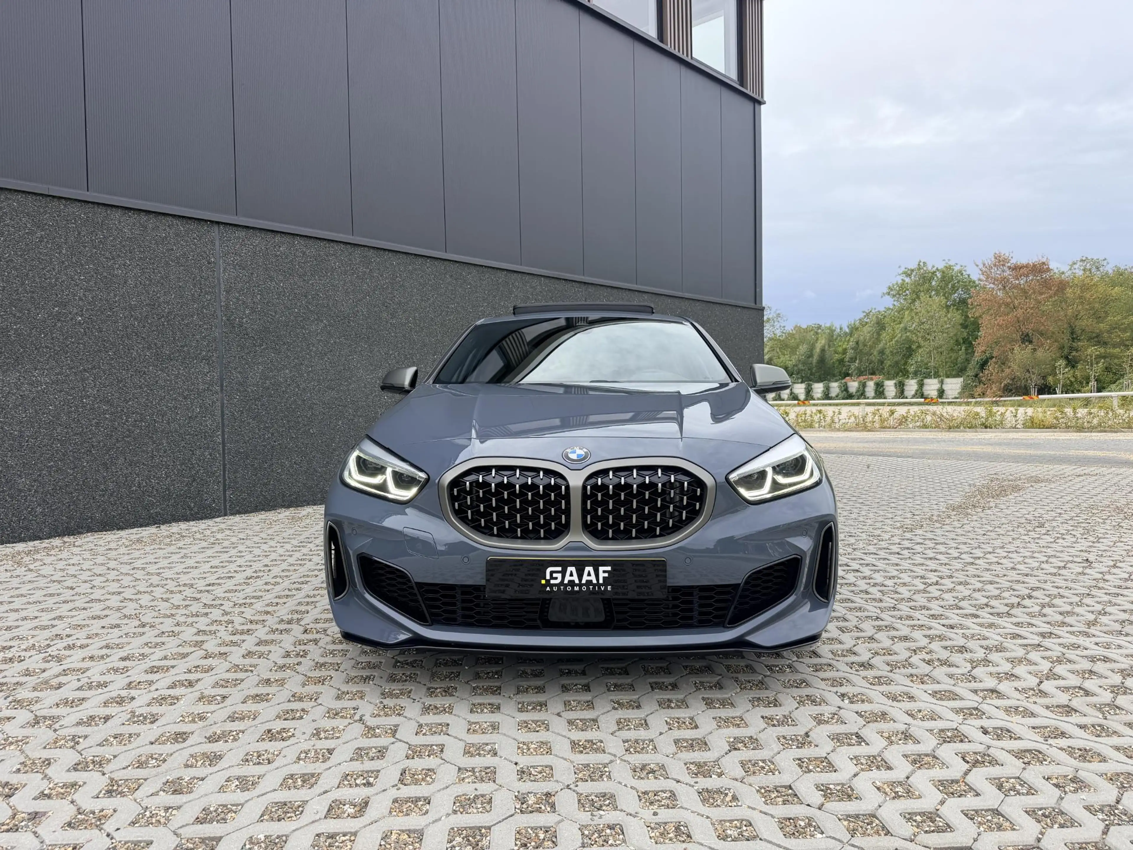 BMW 135 1-serie M135i xDrive High Executive — photo 10