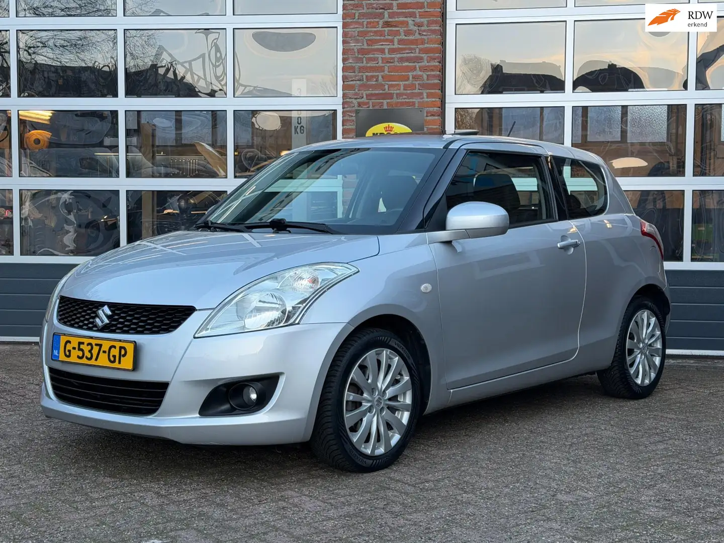 Suzuki Swift 1.2 Comfort , Airco/ECC, Stoelverw, schuifdak, cru Gris - 1