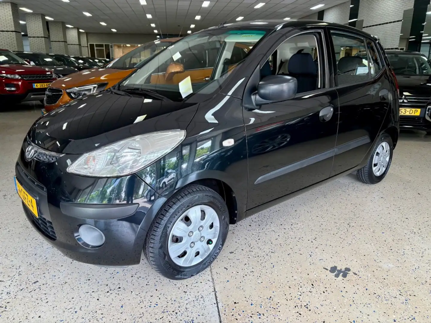 Hyundai i10 1.1 Stuurbekrachtiging CV Radio NAP Noir - 1