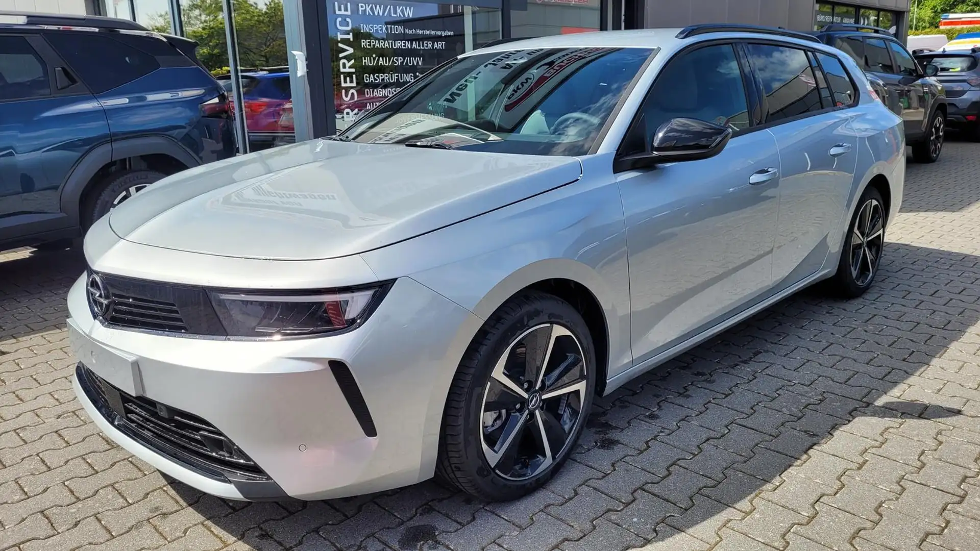 Opel Astra Caravan Edition  ST*LED*Navi*Shzg*Lhzg*PDCv+h*1... Silber - 1