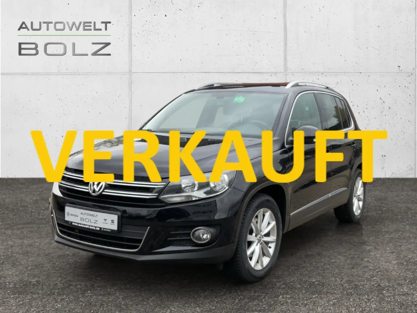 Volkswagen Tiguan Lounge Sport & Style 1.4 TSI Pano Kamera Navi 2-Zo Zwart - 1