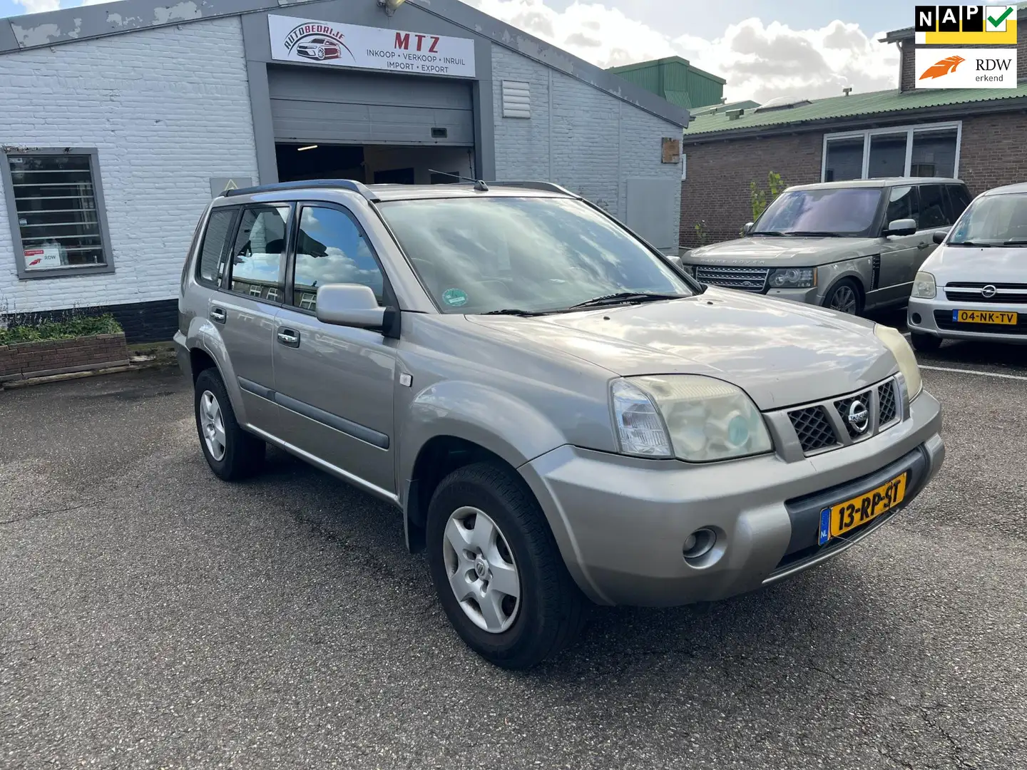 Nissan X-Trail 2.0 Comfort 2wd Climate / NIEUWE APK / DEALER OH Grijs - 1