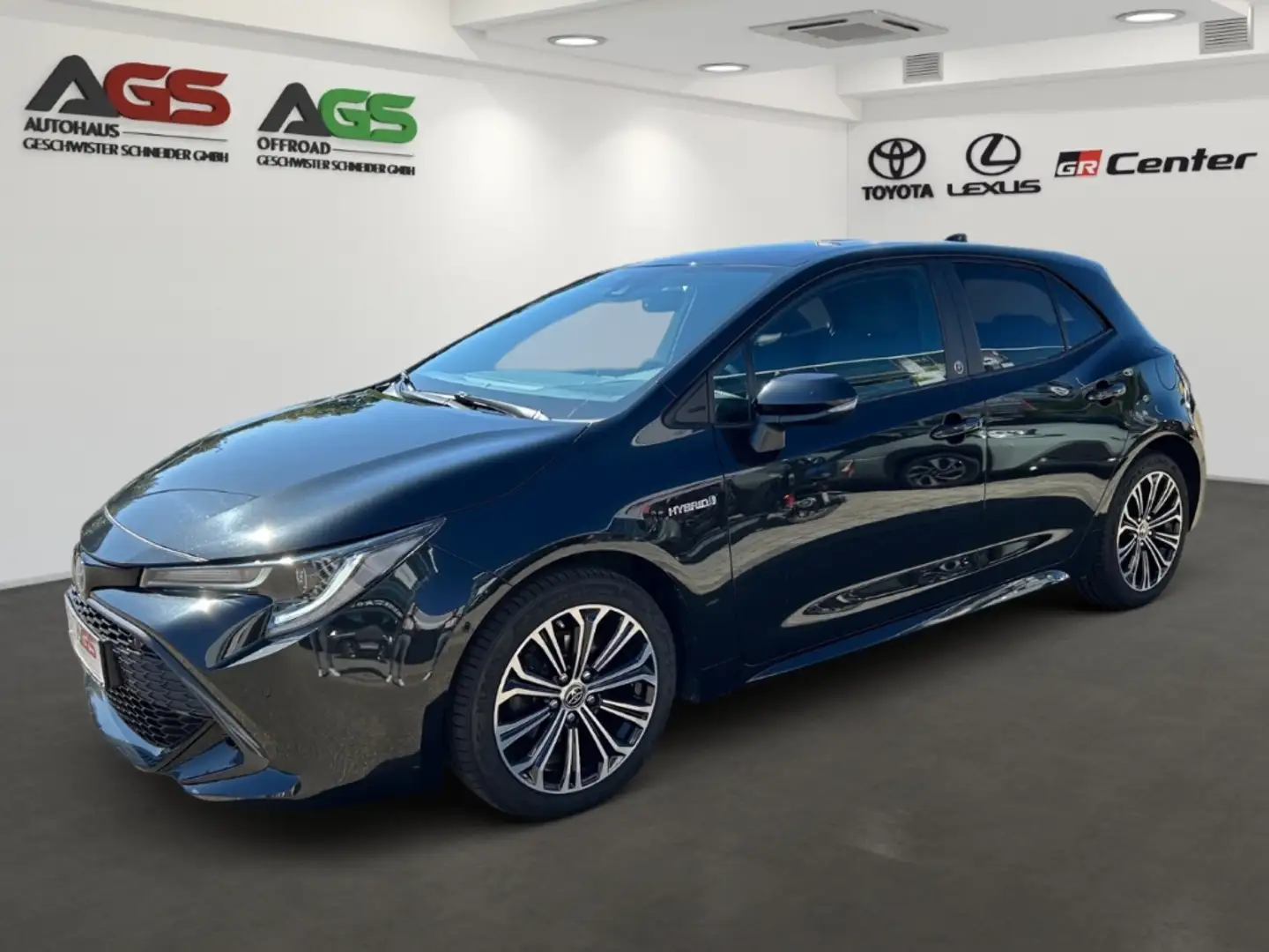 Toyota Corolla Hybrid Team D 1.8L *8-Fach Bereift* Zwart - 1