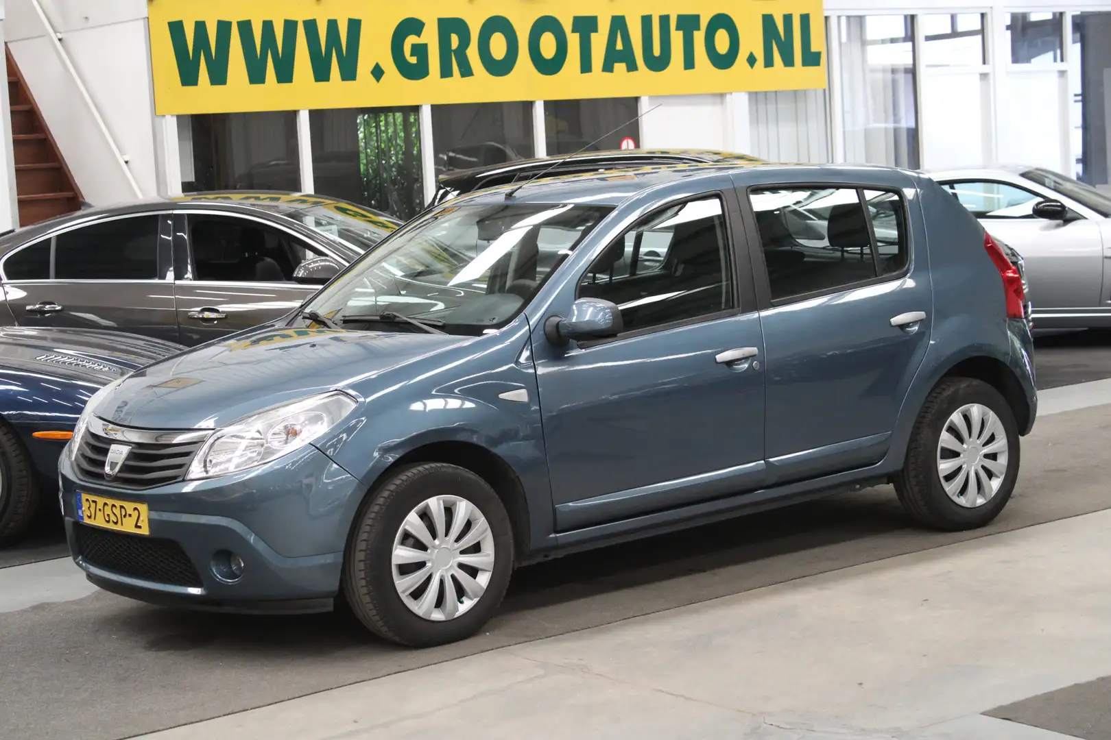 Dacia Sandero 1.4 Lauréate NAP, Airco, Trekhaak, Stuurbekrachtig Blauw - 1