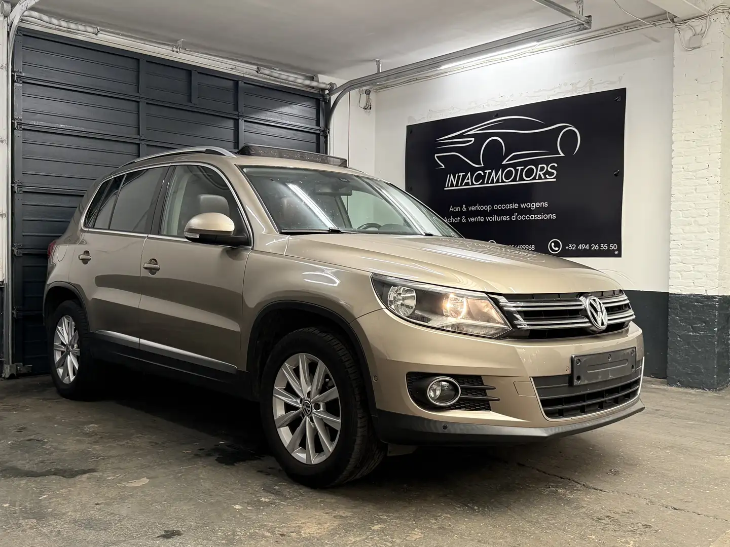 Volkswagen Tiguan Tiguan 1.4 TSI BlueMotion Technology Sport Goud - 1