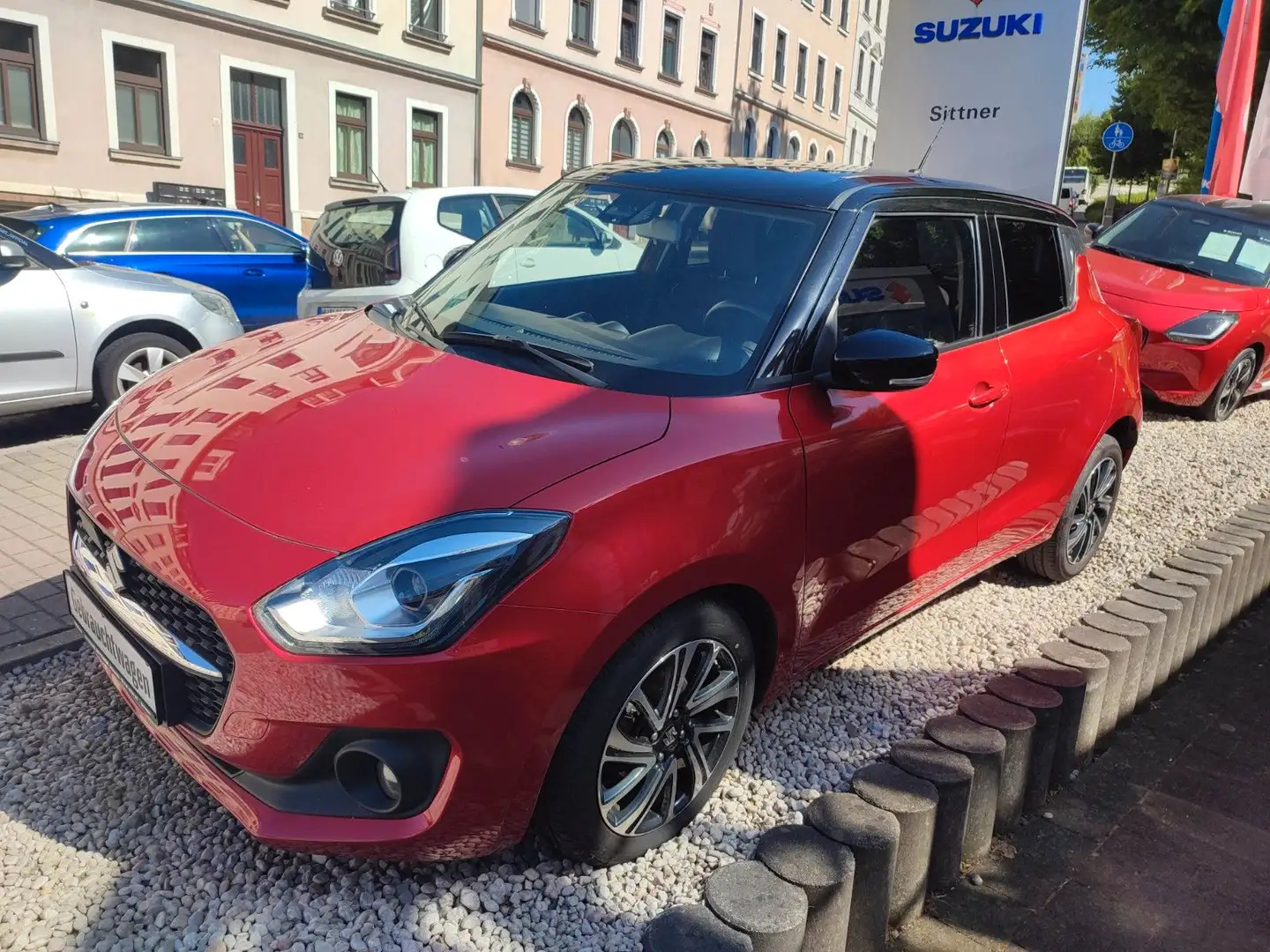 Suzuki Swift 1.2 DUALJET HYBRID Comfort+ Rouge - 1