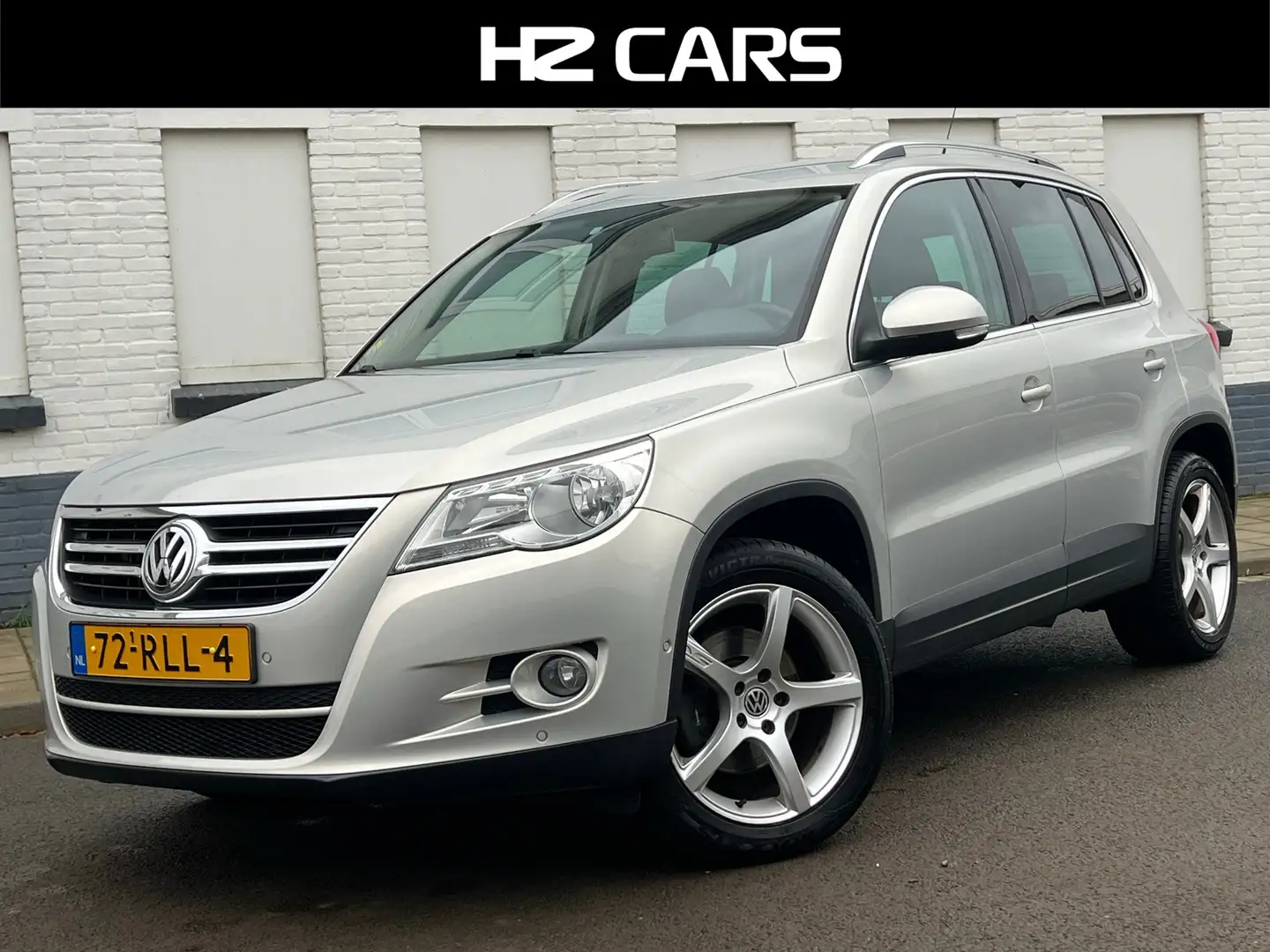 Volkswagen Tiguan 2.0 TDI Sport&Style/Trekhaak/Parkpilot/Clima/Cruis Grijs - 1