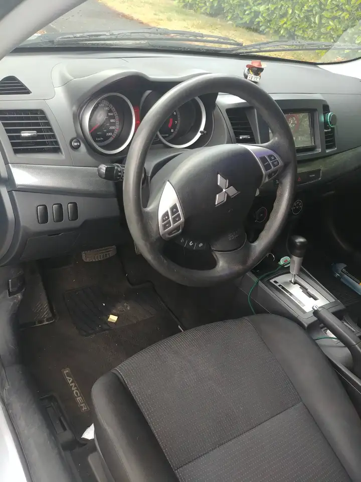 Mitsubishi Lancer photo Mitsubishi Lancer