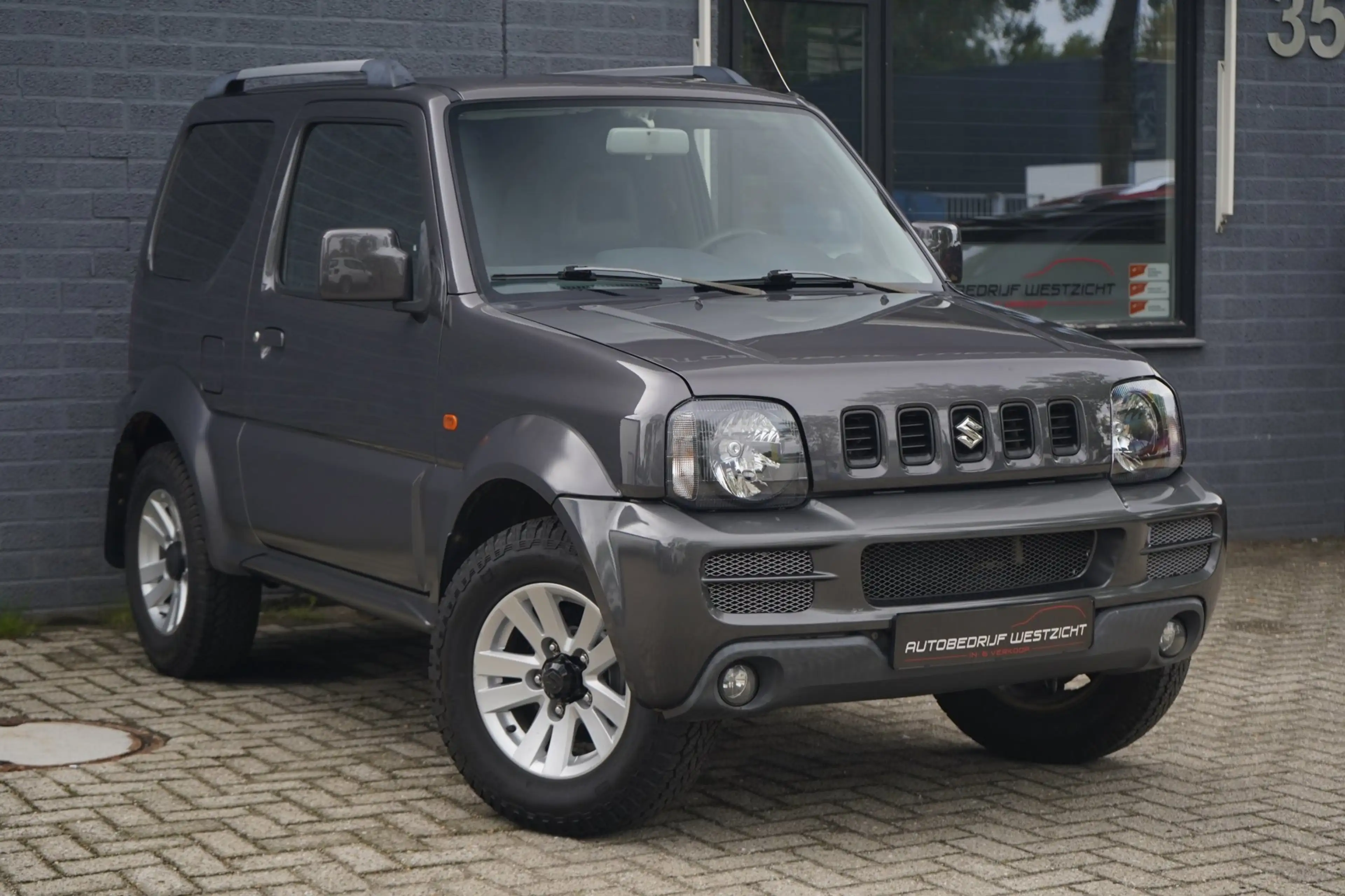 Suzuki Jimny 1.3 Style! 4WD, Leder, Airco, Trekhaak, Stoelv. — photo 2