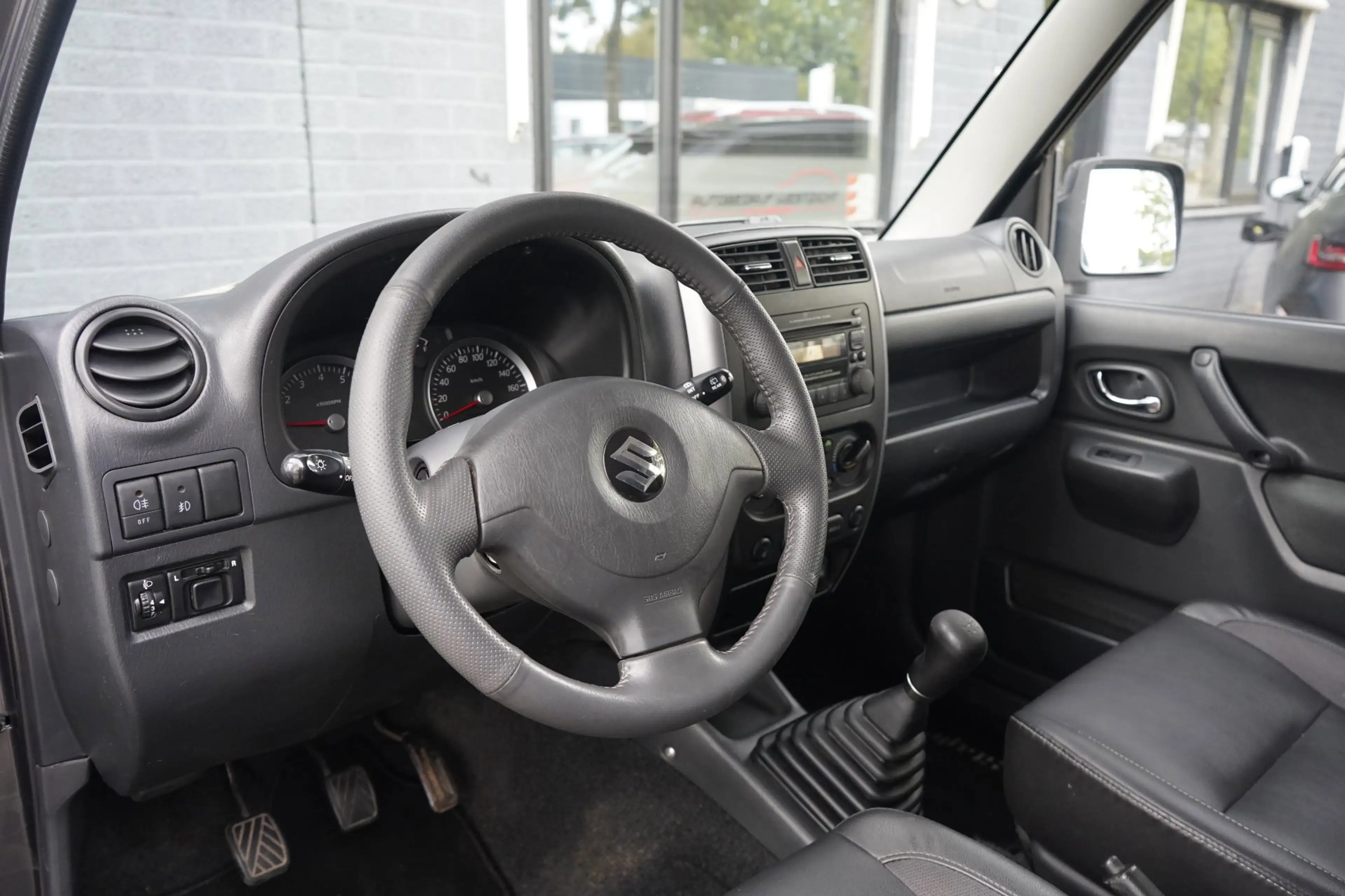 Suzuki Jimny 1.3 Style! 4WD, Leder, Airco, Trekhaak, Stoelv. — photo 14