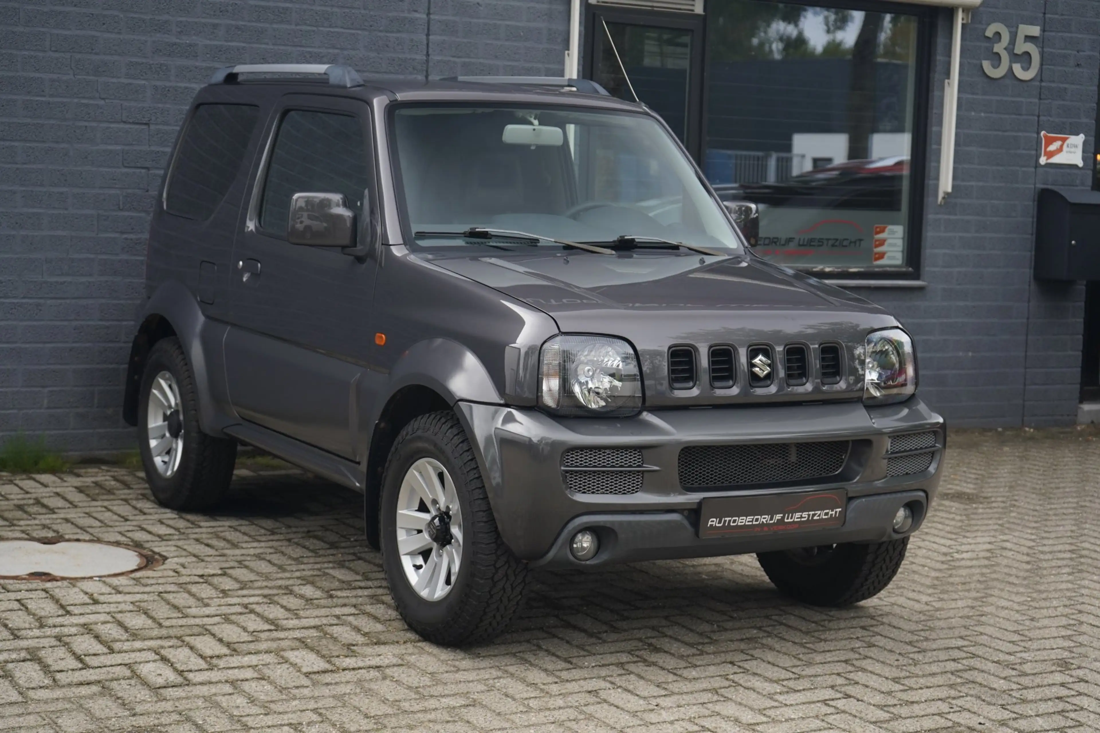 Suzuki Jimny 1.3 Style! 4WD, Leder, Airco, Trekhaak, Stoelv. — photo 18
