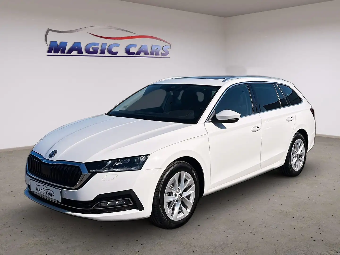 Skoda Octavia Combi 2.0 TDI DSG Style *Pano*Head-Up* Weiß - 1