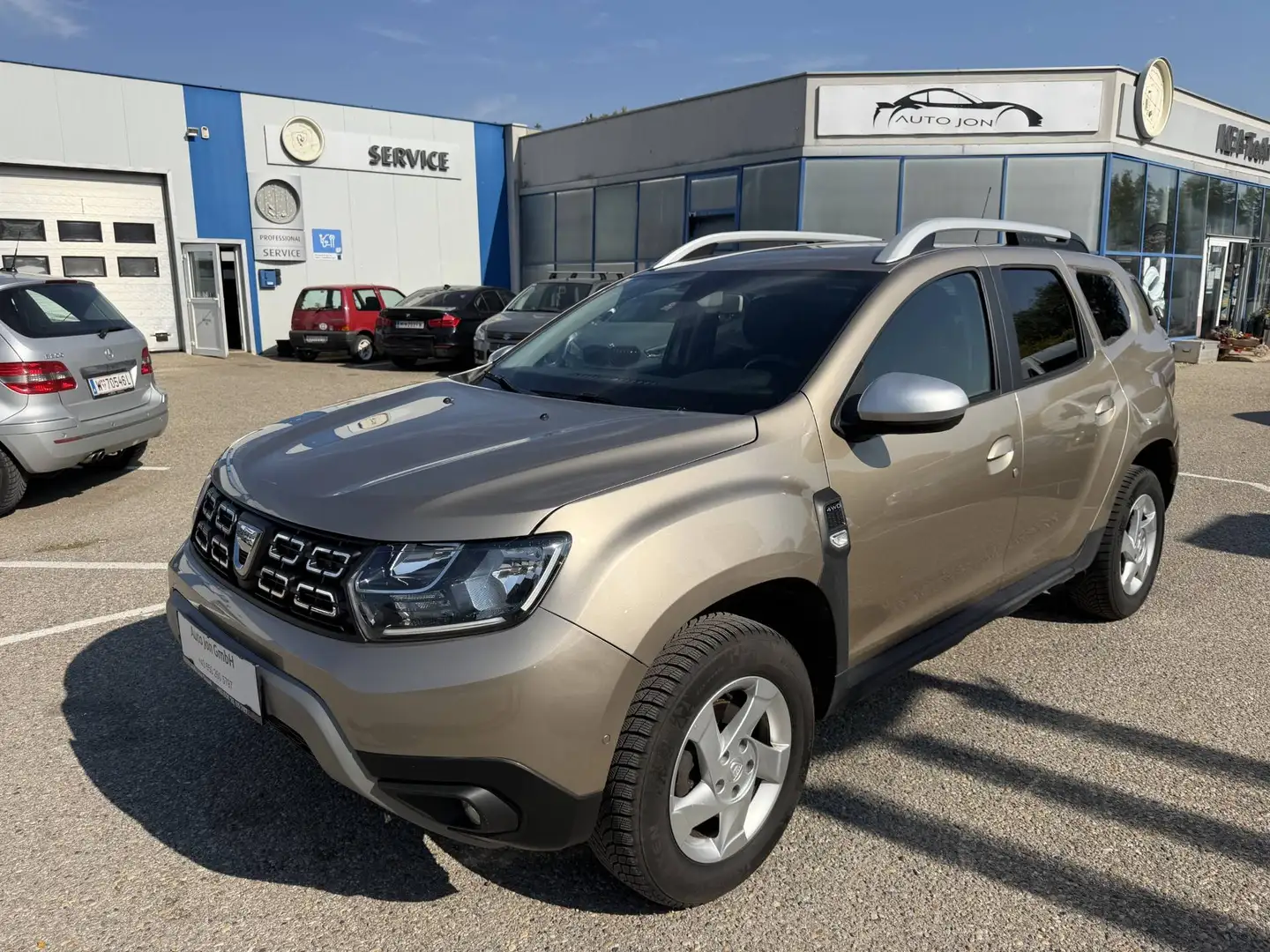 Dacia Duster Prestige 4WD*AHK*Tempomat*Sitzheizung*Navi*Klima* Braun - 1