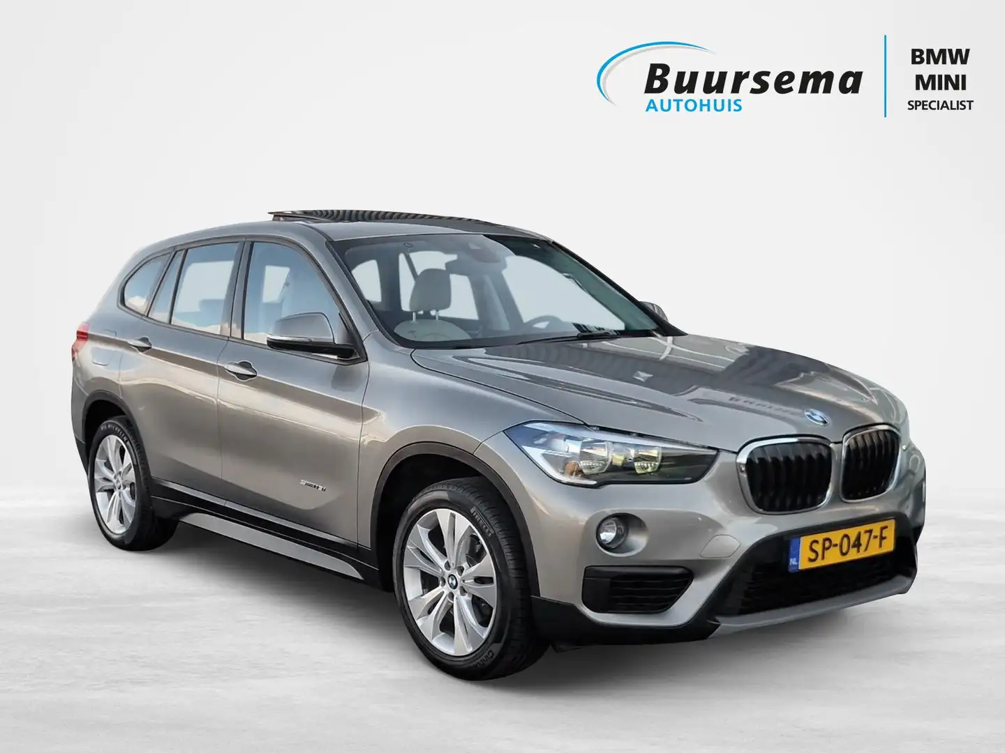 BMW X1 sDrive 18i Cent High Exe | Vollederen sportinterie Argent - 1