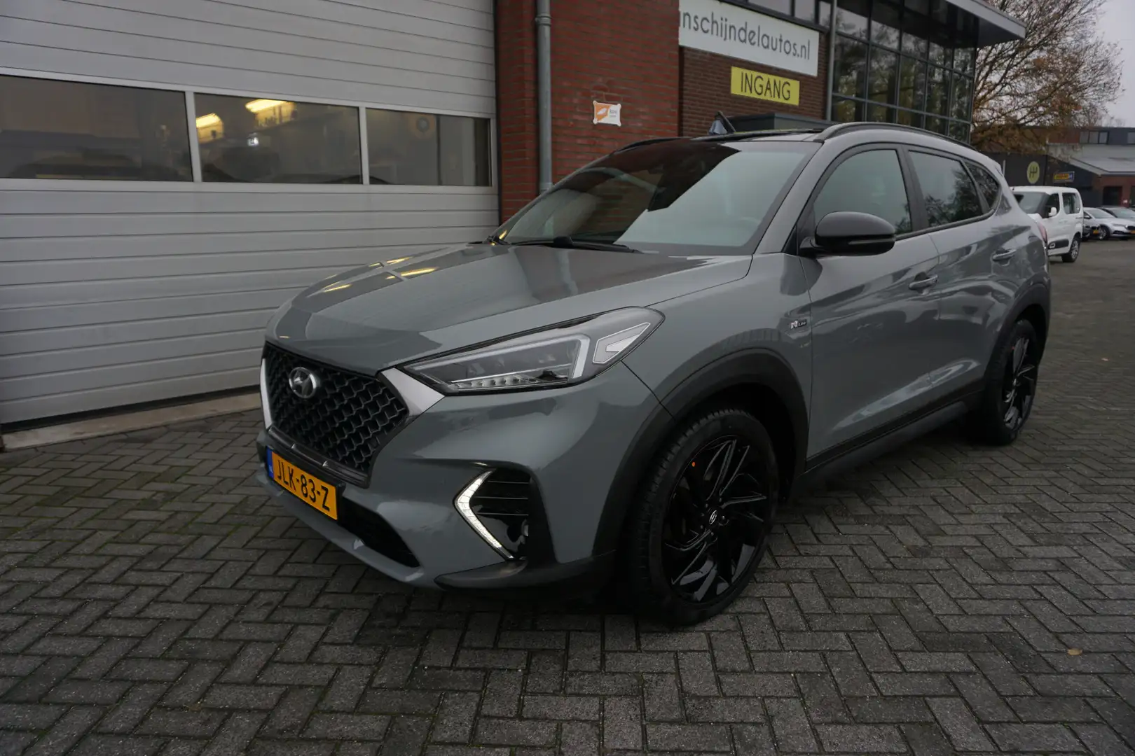 Hyundai TUCSON 1.6 T-GDI 177PK AUTOMAAT N-LINE DEALER ONDERHOUDEN Gris - 2