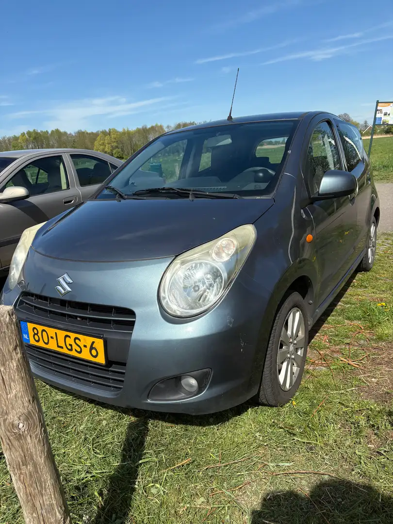 Suzuki Alto Alto 1.0 Exclusive Grijs - 1