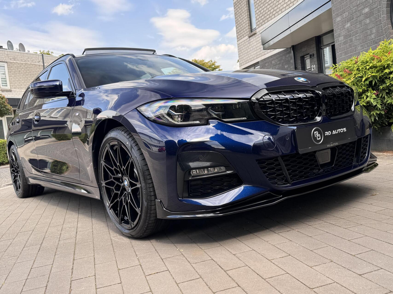 BMW 330 3-serie Touring 330e High Executive M Sport Pano H — photo 17
