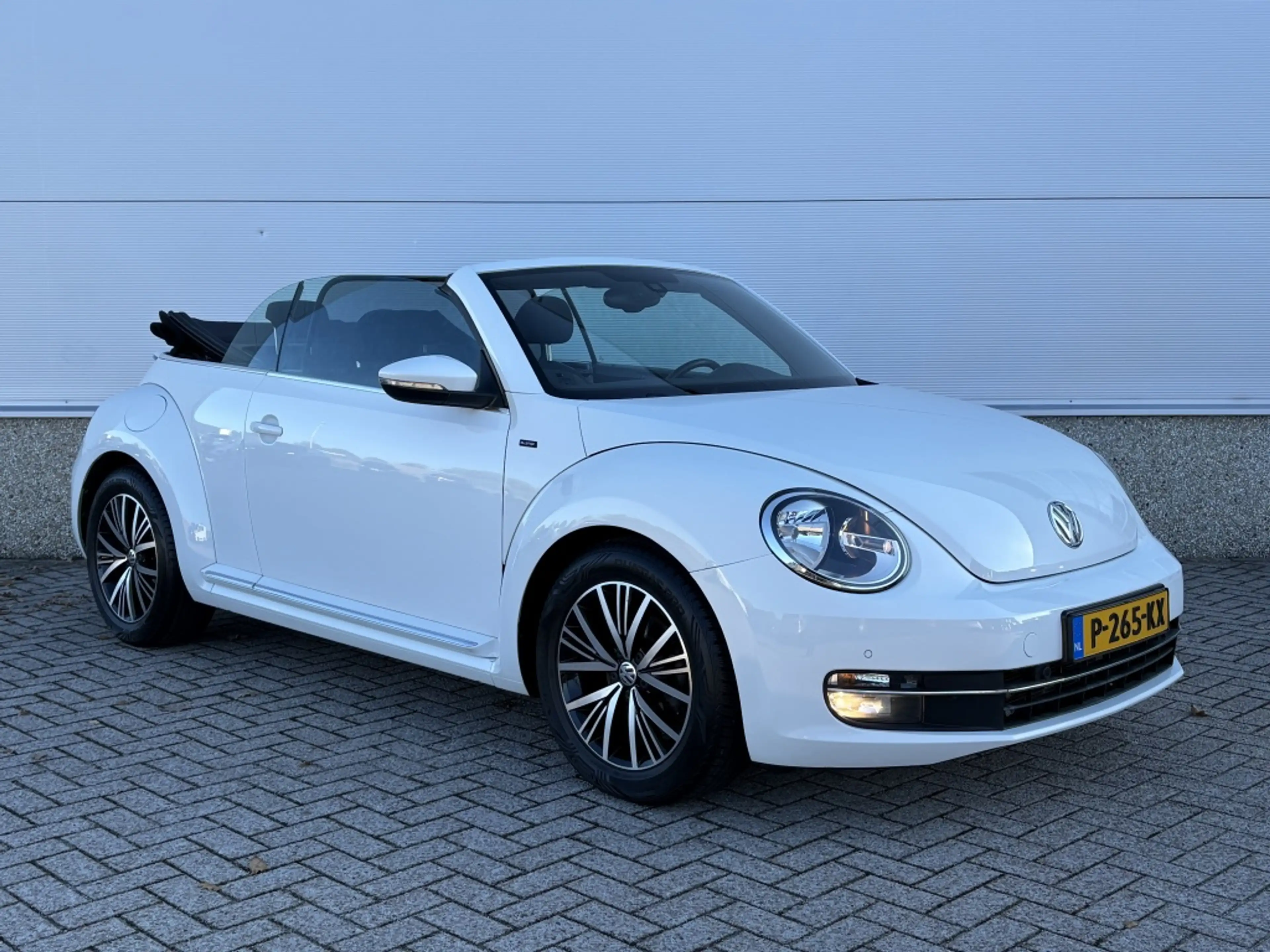 Volkswagen Beetle Cabriolet 1.2 TSI Exclusive S. ALLSTAR! NAVI! CLIM — photo 4
