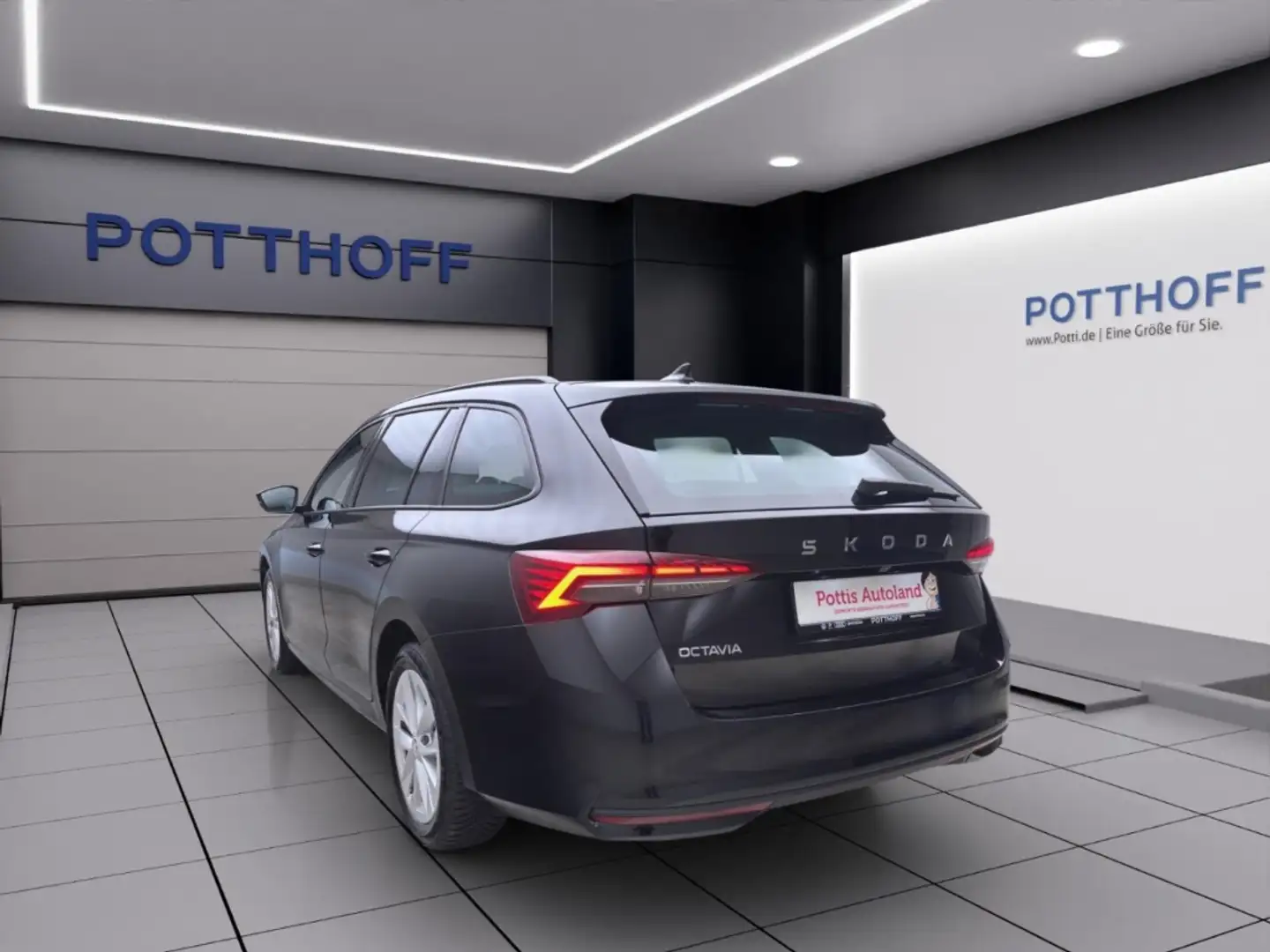 Skoda Octavia Combi 2.0 TDI DSG SELECTION NAVI PDC ACC MATRIX Schwarz - 2