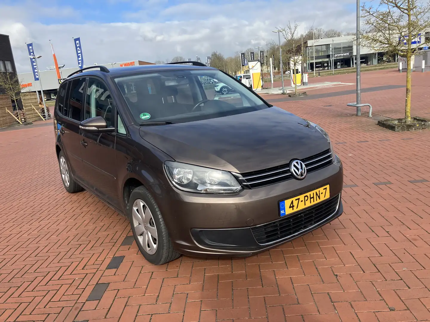 Volkswagen Touran 1.2 TSI Comfl. BlueM Bruin - 1