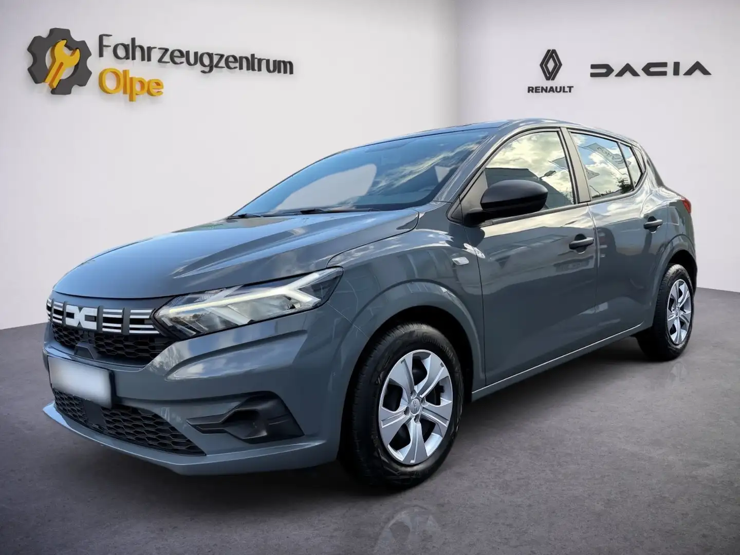 Dacia Sandero SCe 65 Essential, APP-Connect, Klima Gris - 1