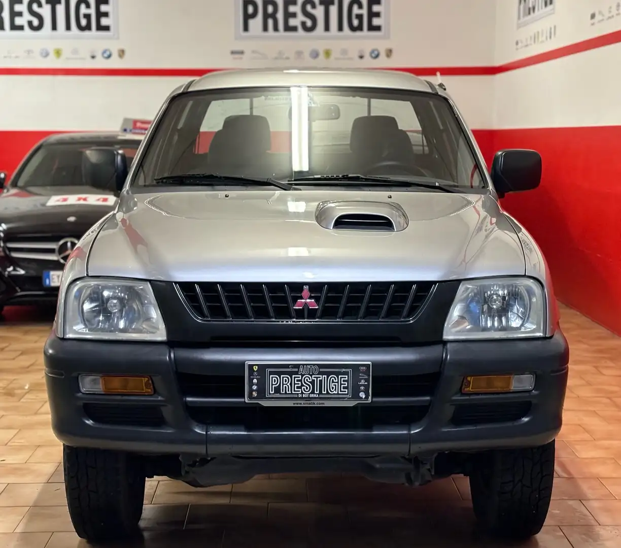 Mitsubishi L200 2.5 tdi GLS Special Action 4wd Silber - 2