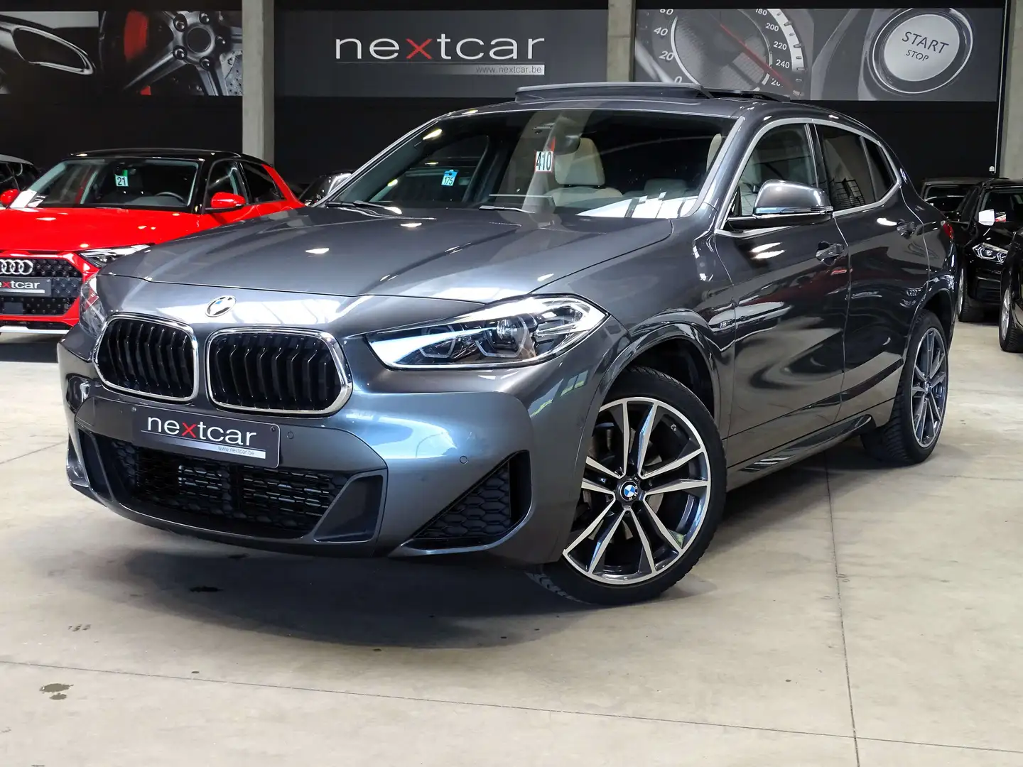 BMW X2 2.0iA sDrive Kit M *LED-PANO-CUIR-NAVI-19\-HUD* Grijs - 1