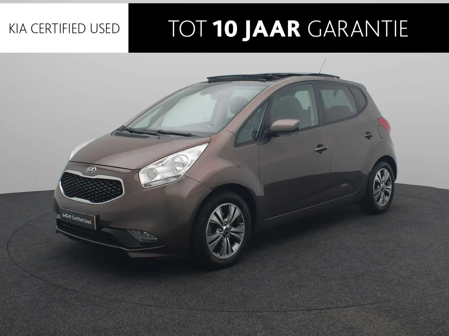Kia Venga 1.4 CVVT ExecutiveLine | 1e Eigenaar | Trekhaak | Bruin - 1