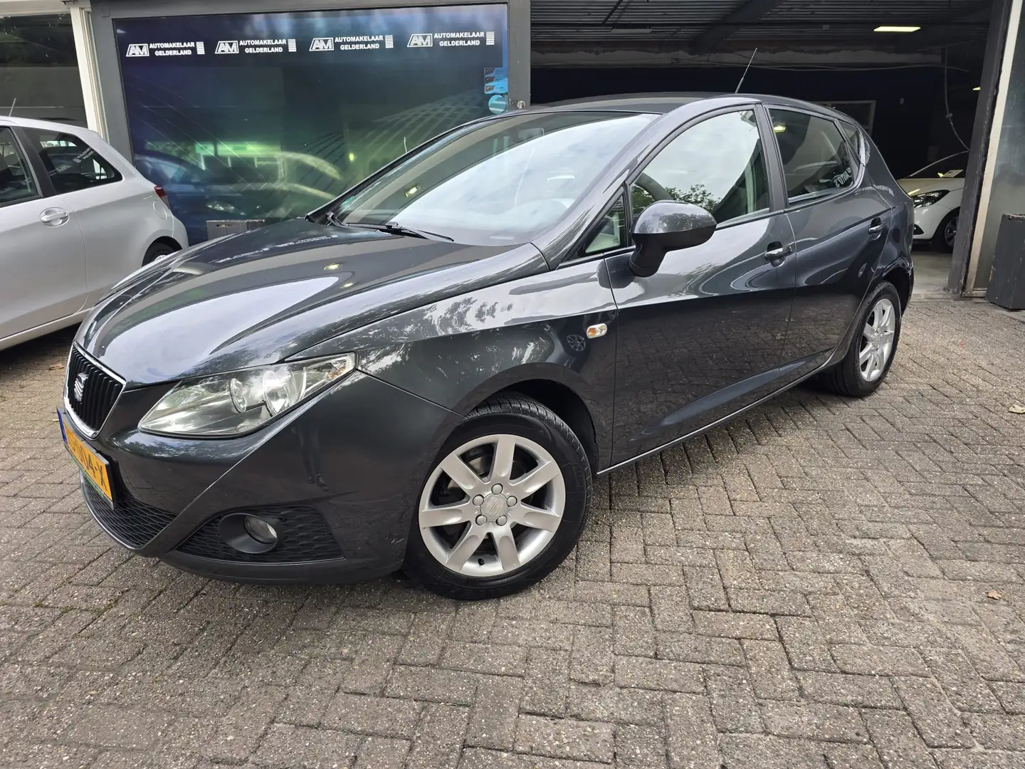 SEAT Ibiza 1.2 Beat | 12MND GARANTIE | AIRCO | NAVI | CRUISE Gris - 1