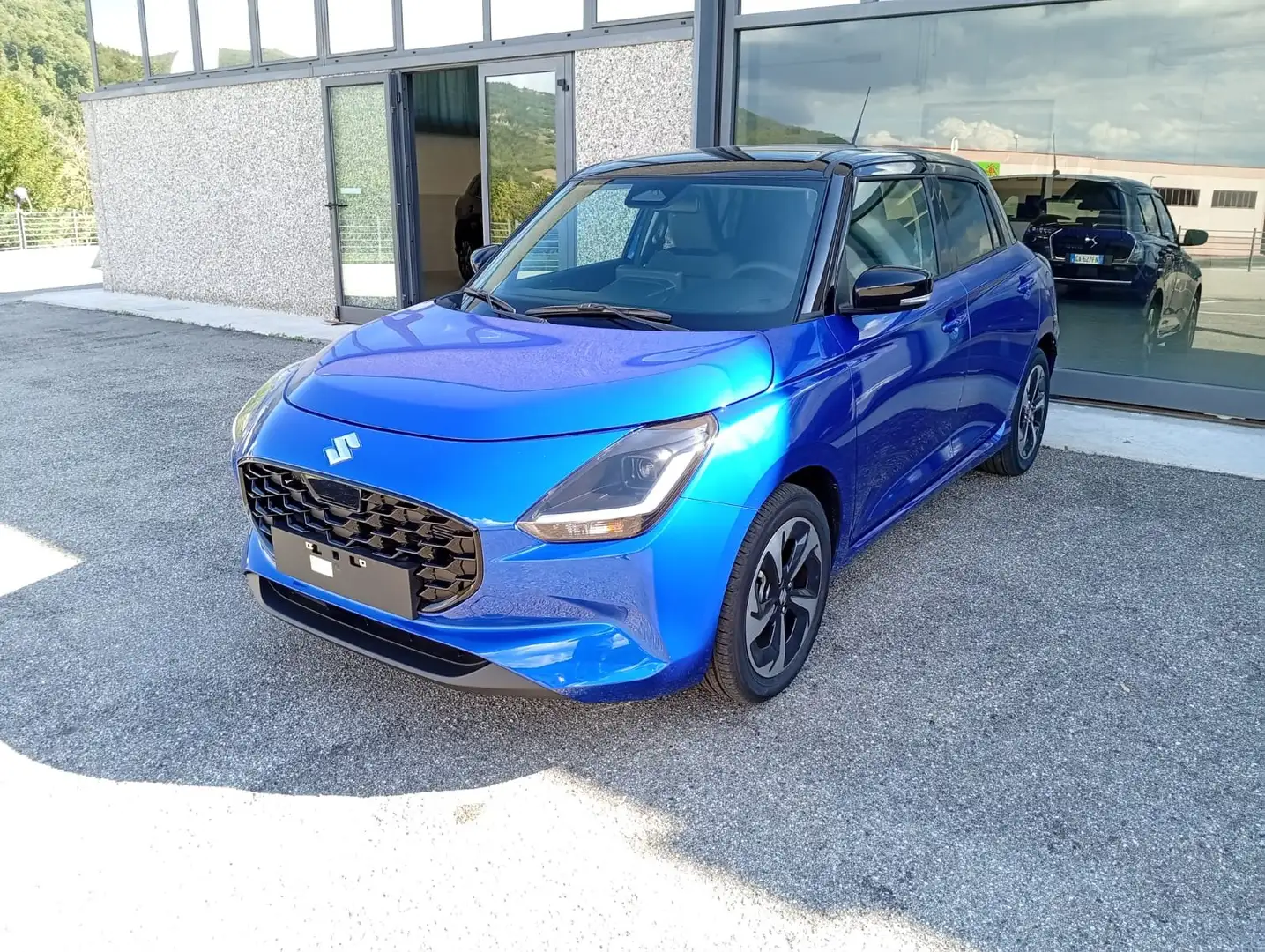 Suzuki Swift Waku 1200 cc Hybrid Oranje - 1