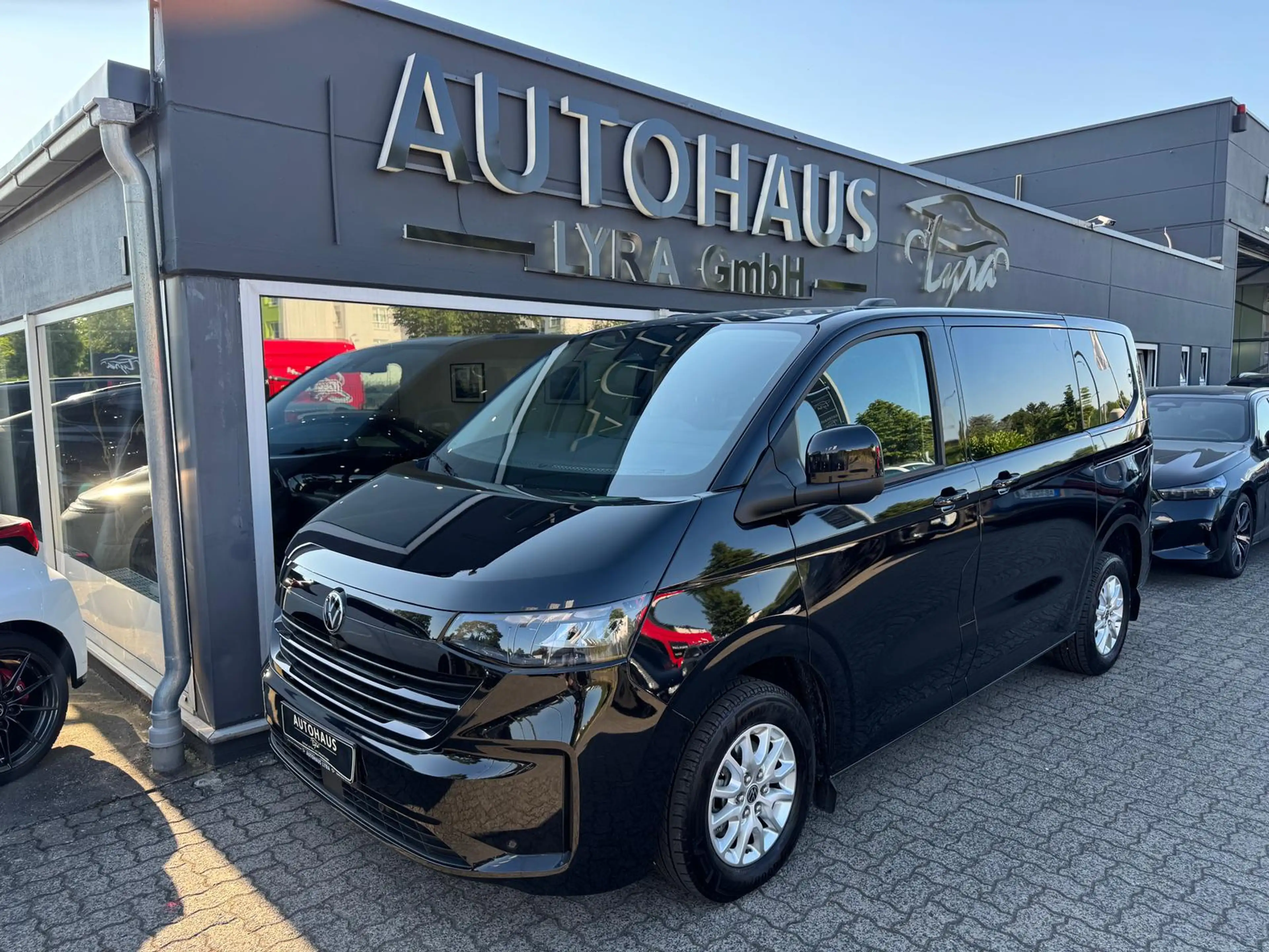 Volkswagen T7 Caravelle 2.0 TDI DSG 4 Motion*LED*NAVI*KAM* — photo 2