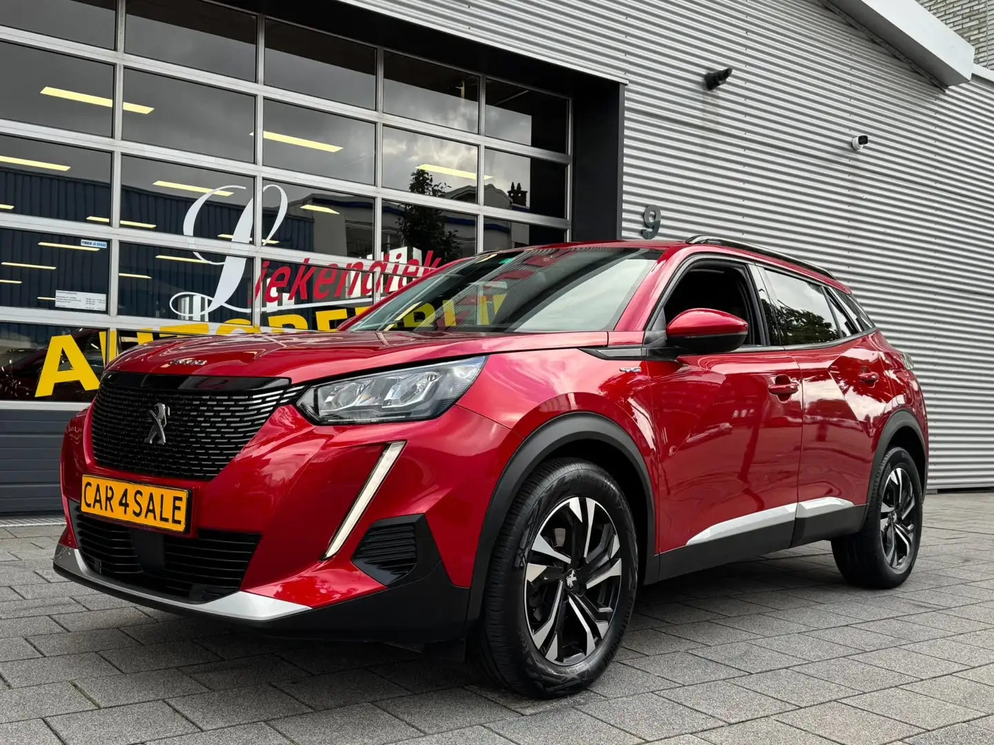 Peugeot 2008 1.2 PureTech Allure - Navigatie I LED/Xenon I PDC Rojo - 1
