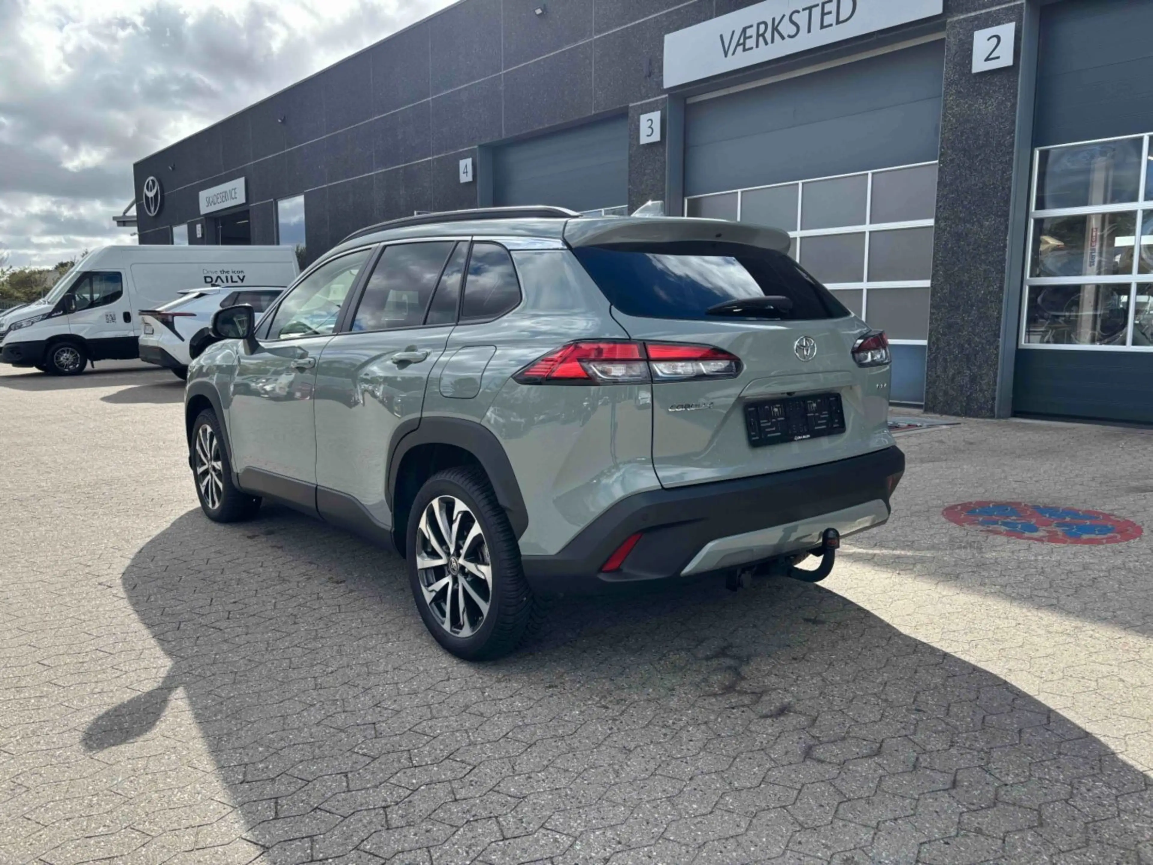 Toyota Corolla Cross 1.8 Hybrid Style Comfort BSM+AHK — photo 3