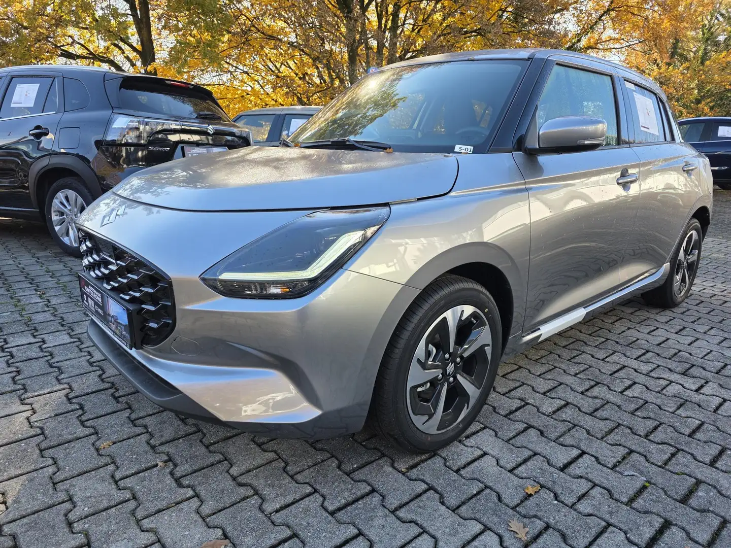 Suzuki Swift SWIFT 1.2 Dualjet Hybrid Comfort+ Silber - 1