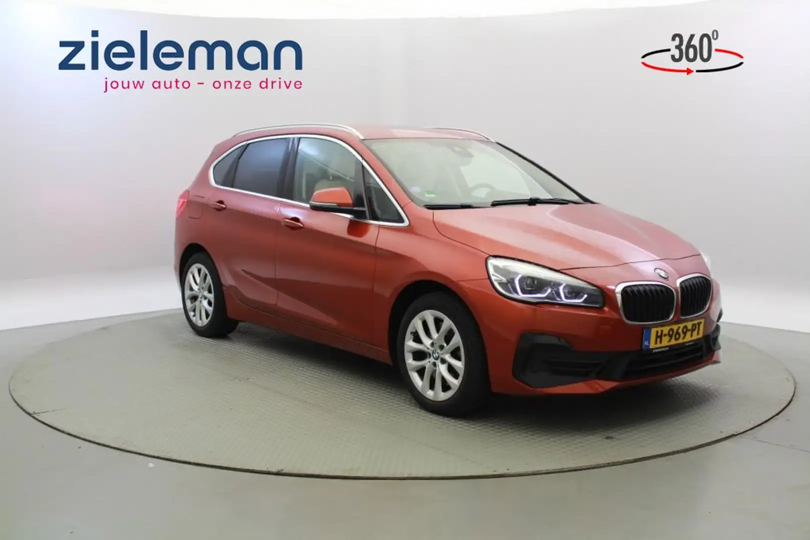 BMW 225 225xe iP Executive Automaat - Camera, Leer, Stoelv Oranje - 1