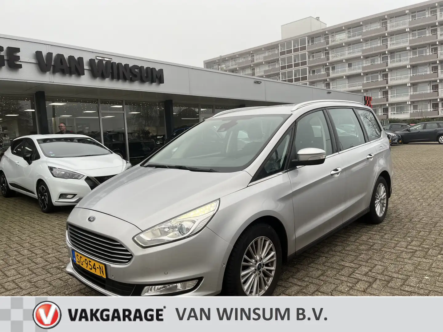 Ford Galaxy 1.5 Titanium 7Pers Pdc Navi Cruise Lmv Stoelverw. Grijs - 1