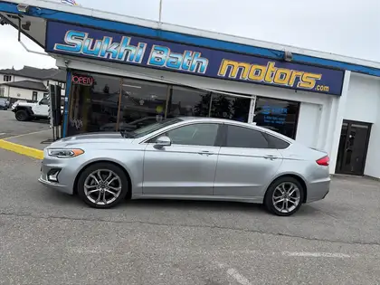 Silver 2020 Ford Fusion Hybrid Sedan Front-Wheel Drive Automatic