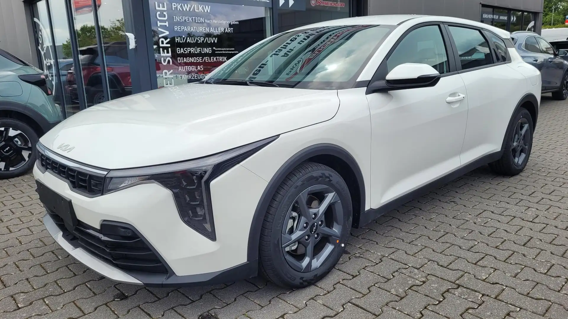 Kia K4 Vision 1.0 +NAVI+SHZ+ACA+LED+KAMERA 85 kW (116 ... Weiß - 1