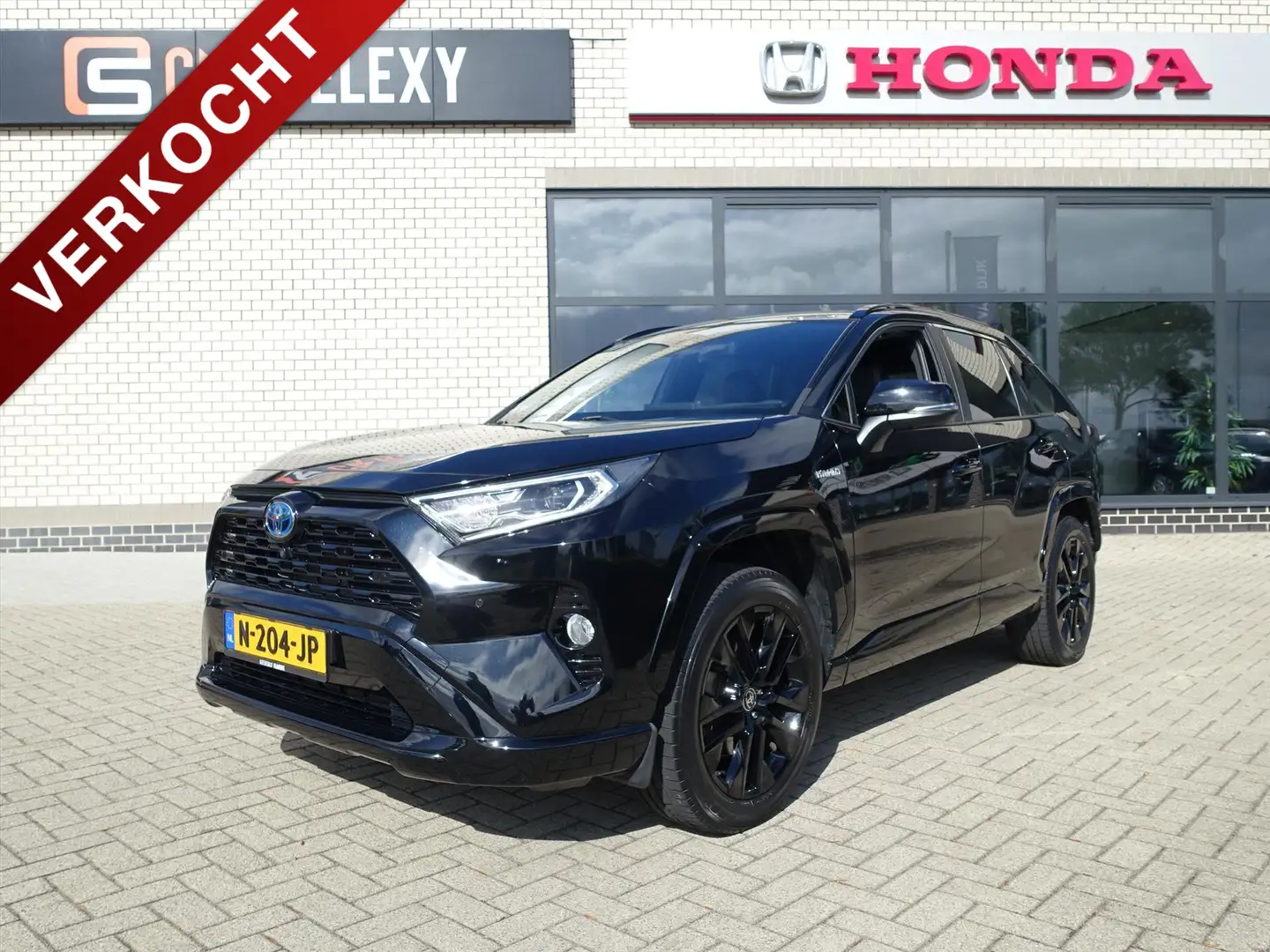 Toyota RAV 4 2.5 Hybrid AWD 222pk CVT Black Edition, maar 19.12 Zwart - 1