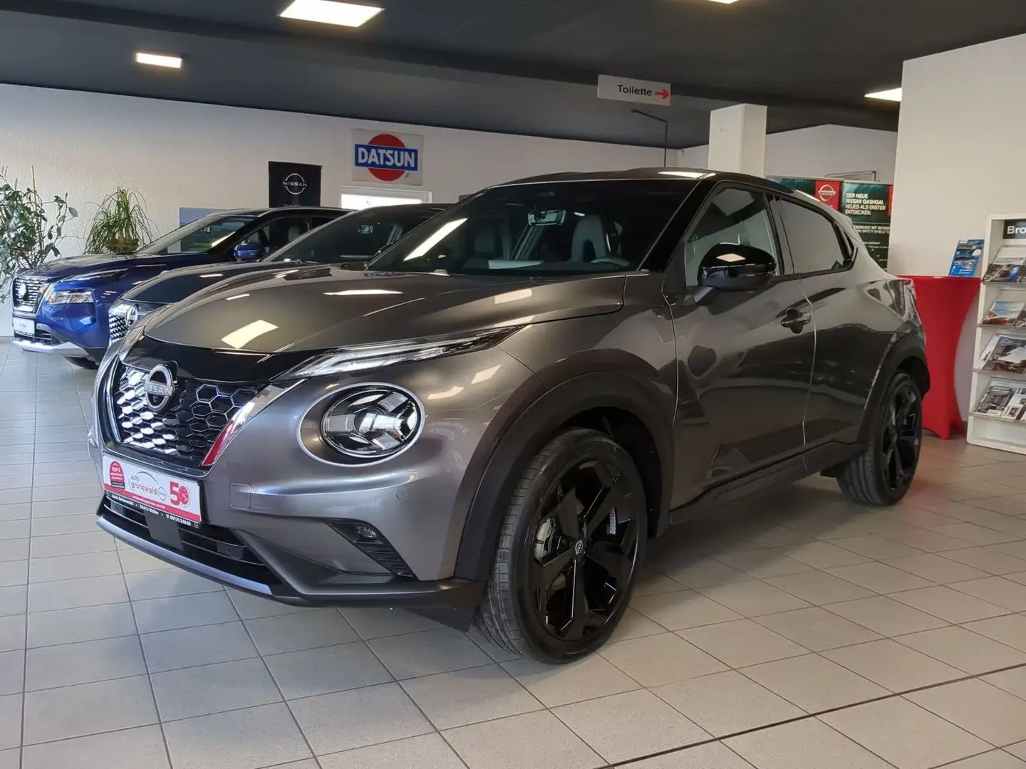 Nissan Juke 1.6 Hybrid Tekna,BOSE,LED,360°,Sitzhzg,Navi Grau - 1