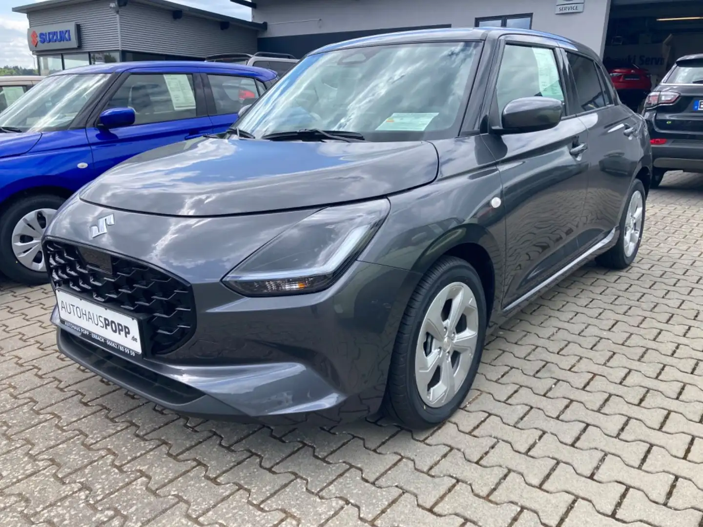 Suzuki Swift 1.2 DUALJET HYBRID Automatik Comfort Gris - 1