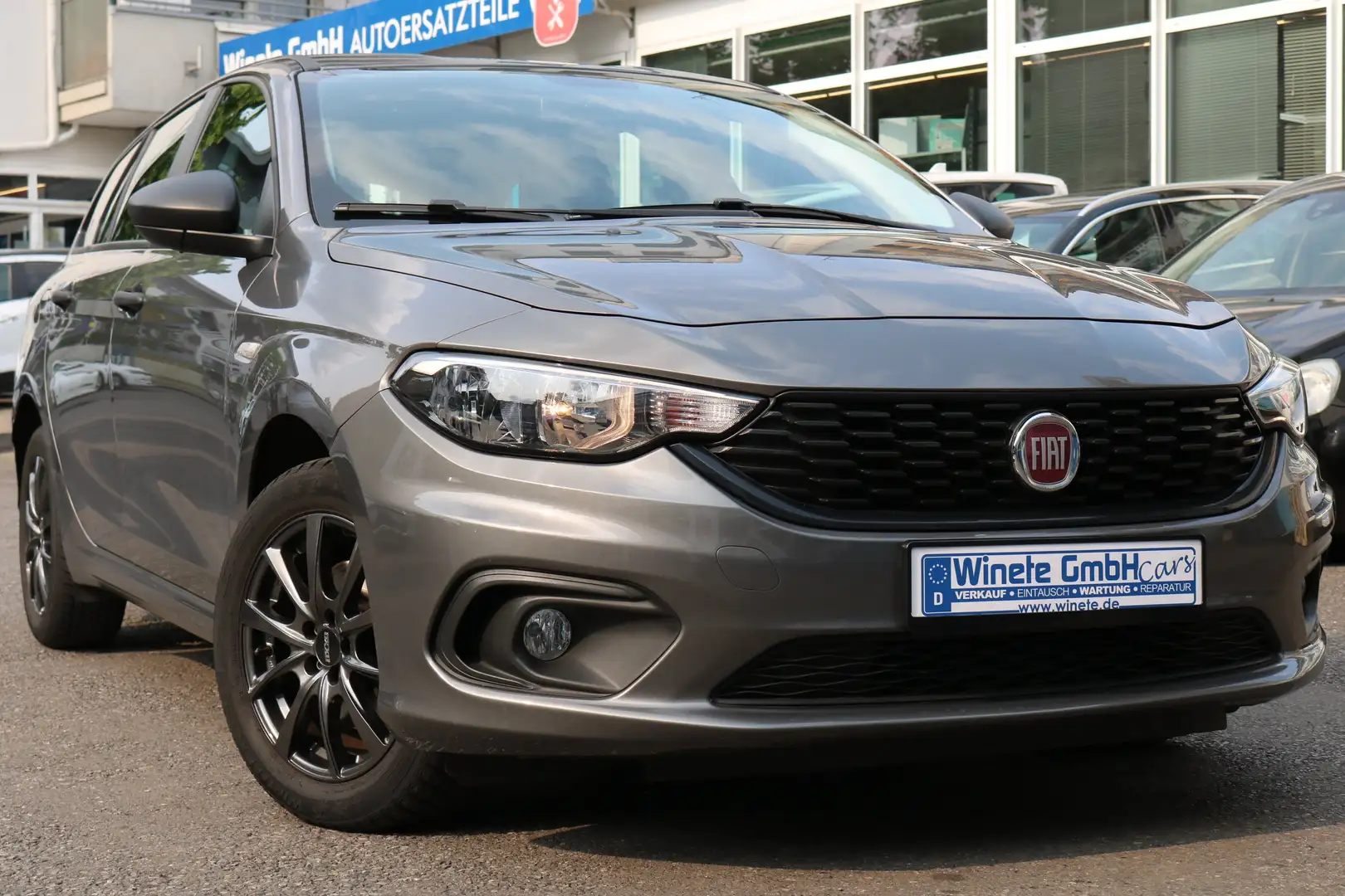 Fiat Tipo Street*1HAND*SHZ*PDC*NAVI*Klimaaut*8FachBereift*uv Gris - 1