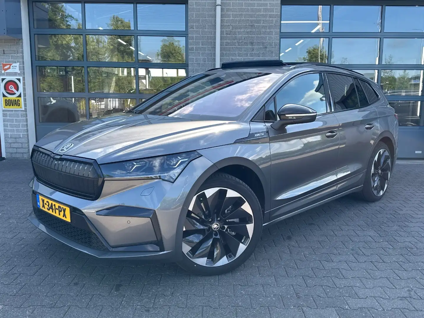 Skoda Enyaq iV 80X Sportline | Trekhaak | VOL | Grijs - 1