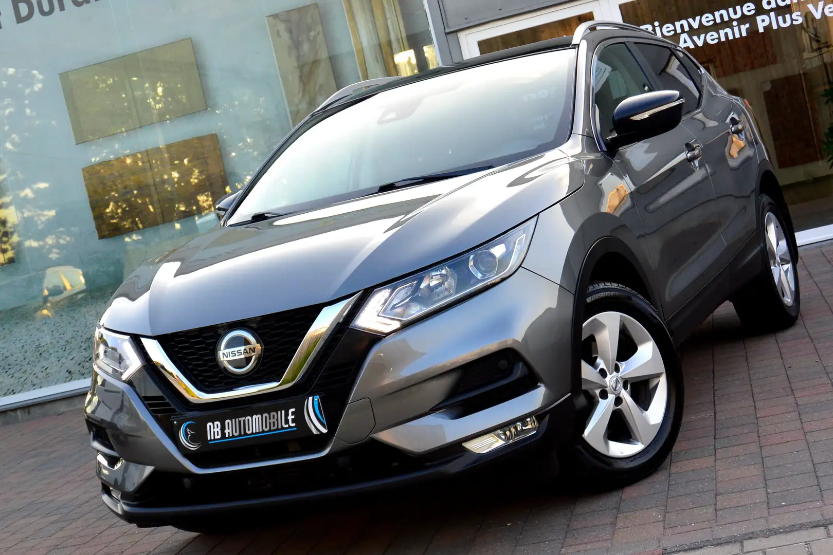 Nissan Qashqai 1.2 New Tekna *BT.AUTO*T.PANO*CAMERA*NAVI*GARANTIE Gris - 1