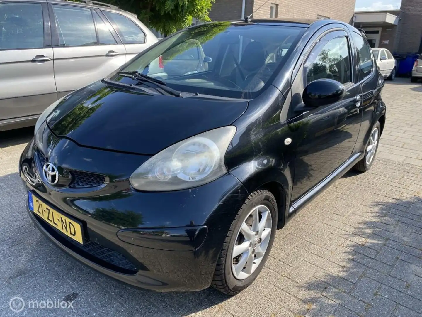 Toyota Aygo 1.0-12V + AIRCO HALF LEDER APK 26-06-2026 Fekete - 1