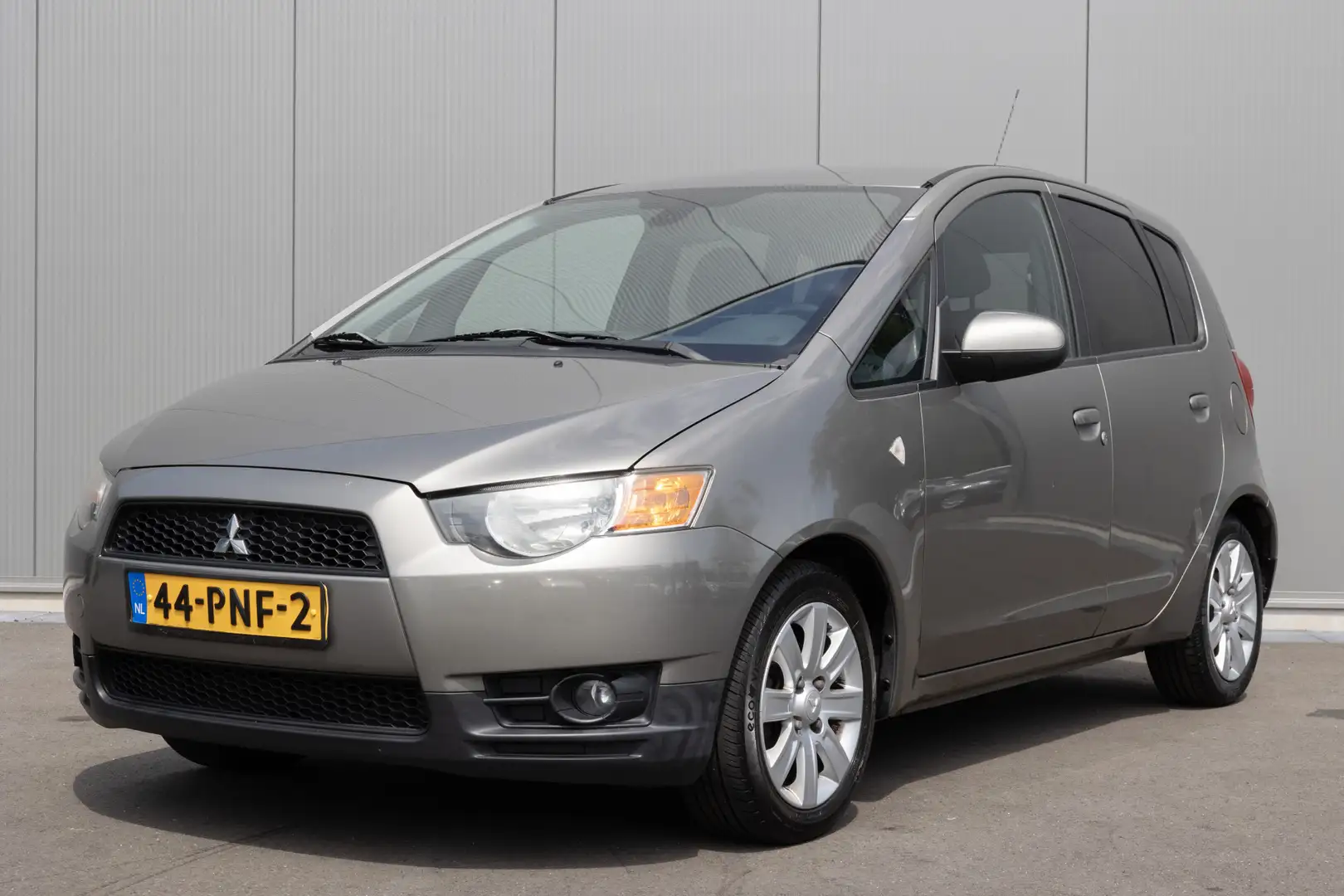 Mitsubishi Colt 1.3 Edition Two | AIRCO | CRUISE | TREKHAAK | NL-A Grijs - 1